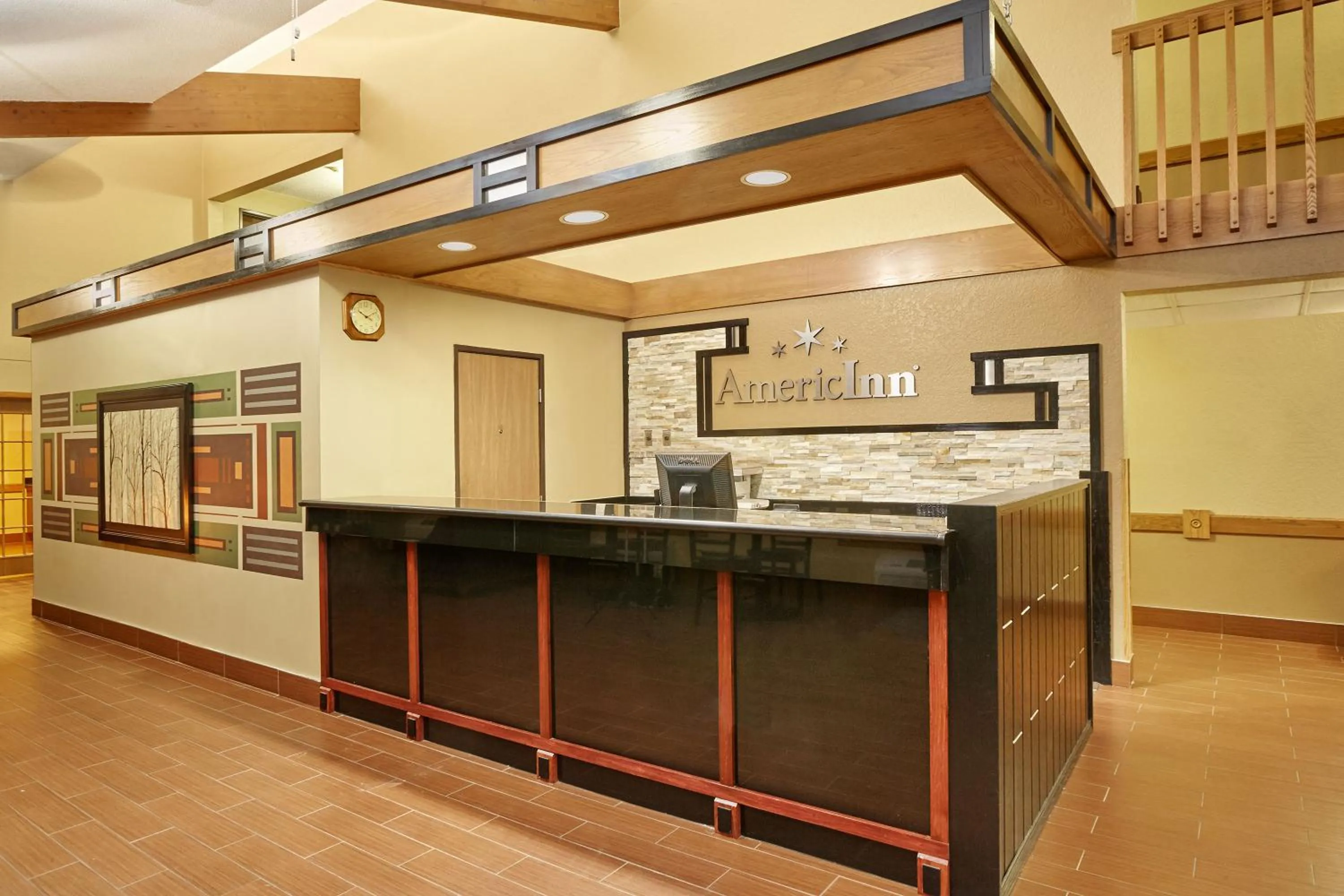 Lobby or reception in AmericInn by Wyndham Burlington