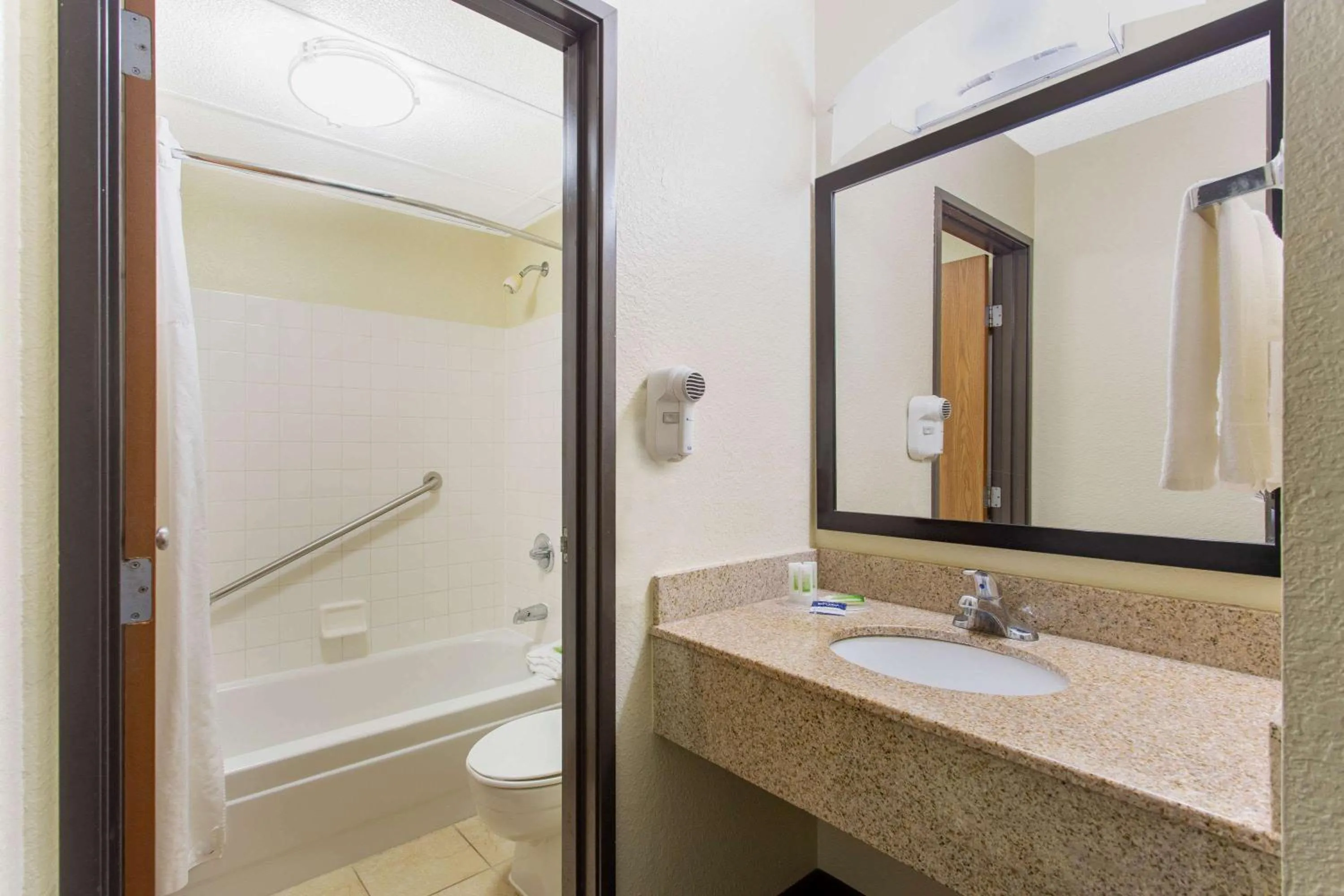 Bathroom in AmericInn by Wyndham Burlington