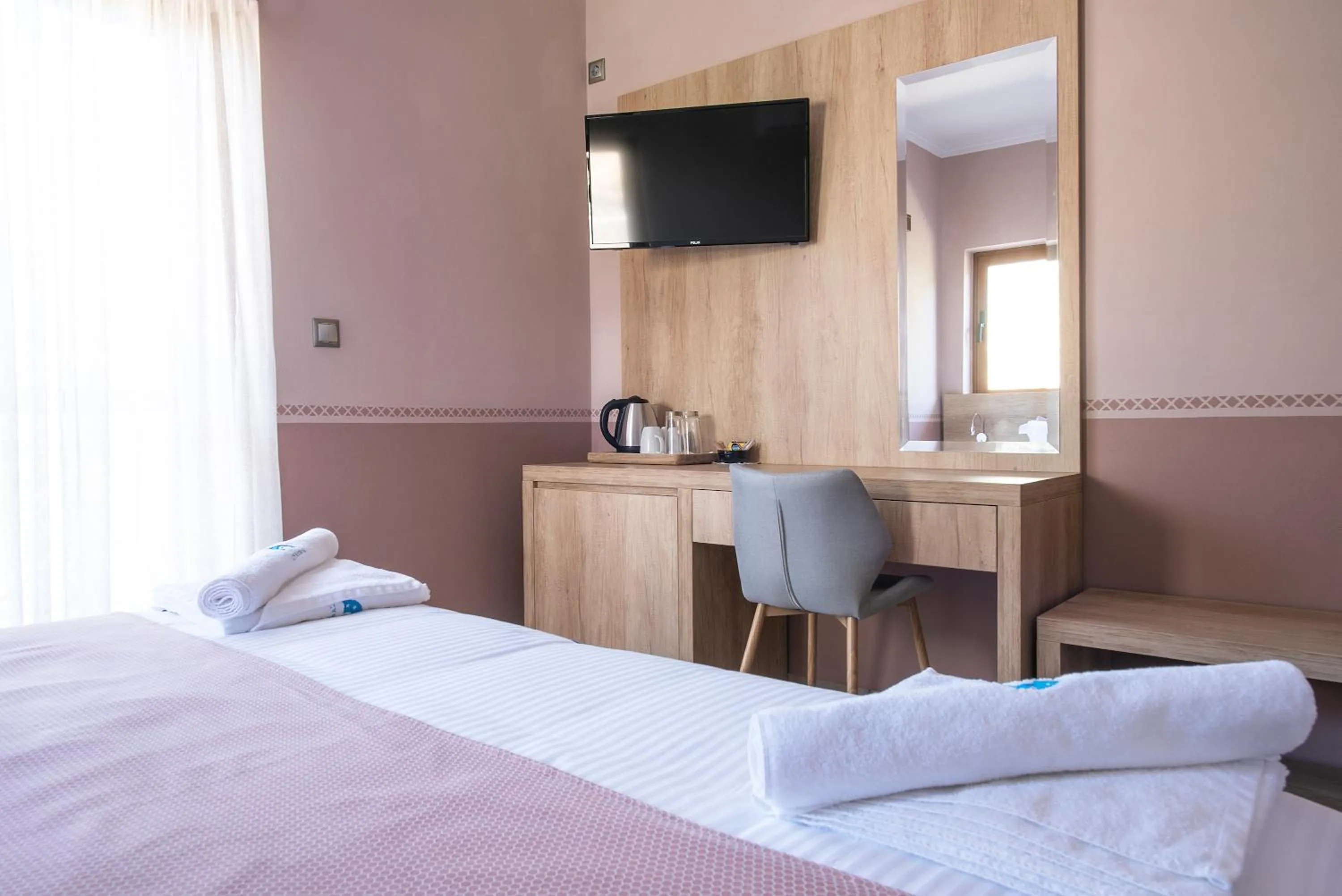 Bed in Cyrenia Guesthouse