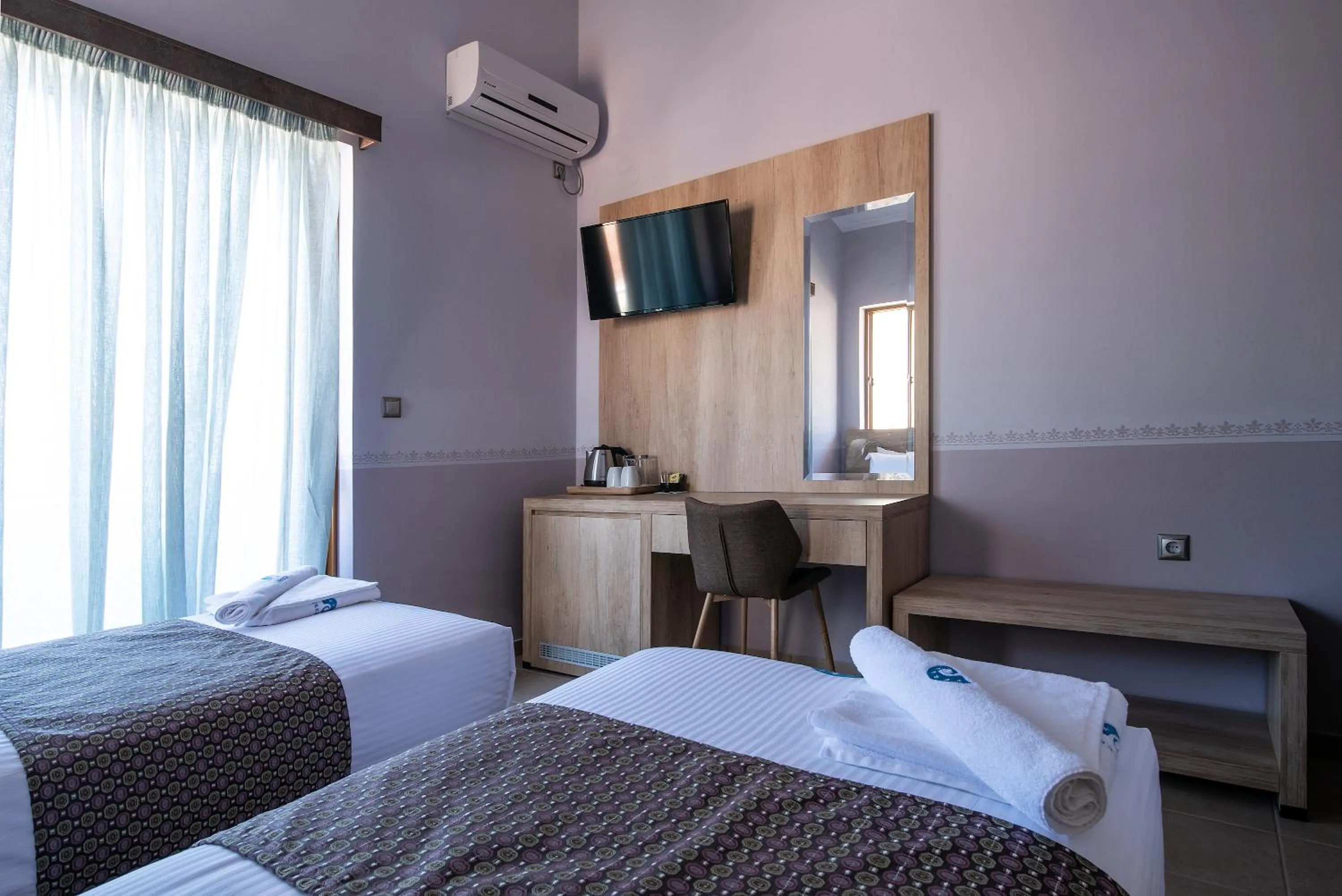 Bed in Cyrenia Guesthouse