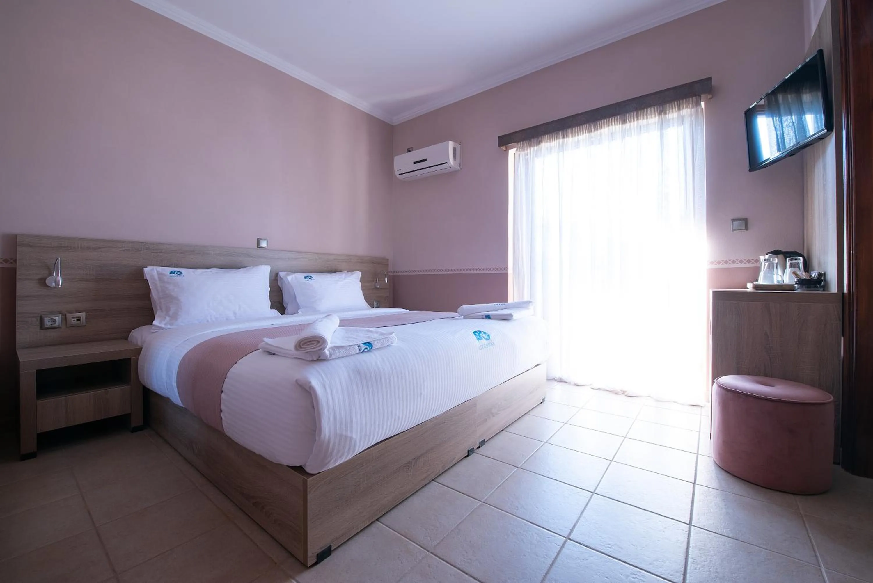 Bed in Cyrenia Guesthouse