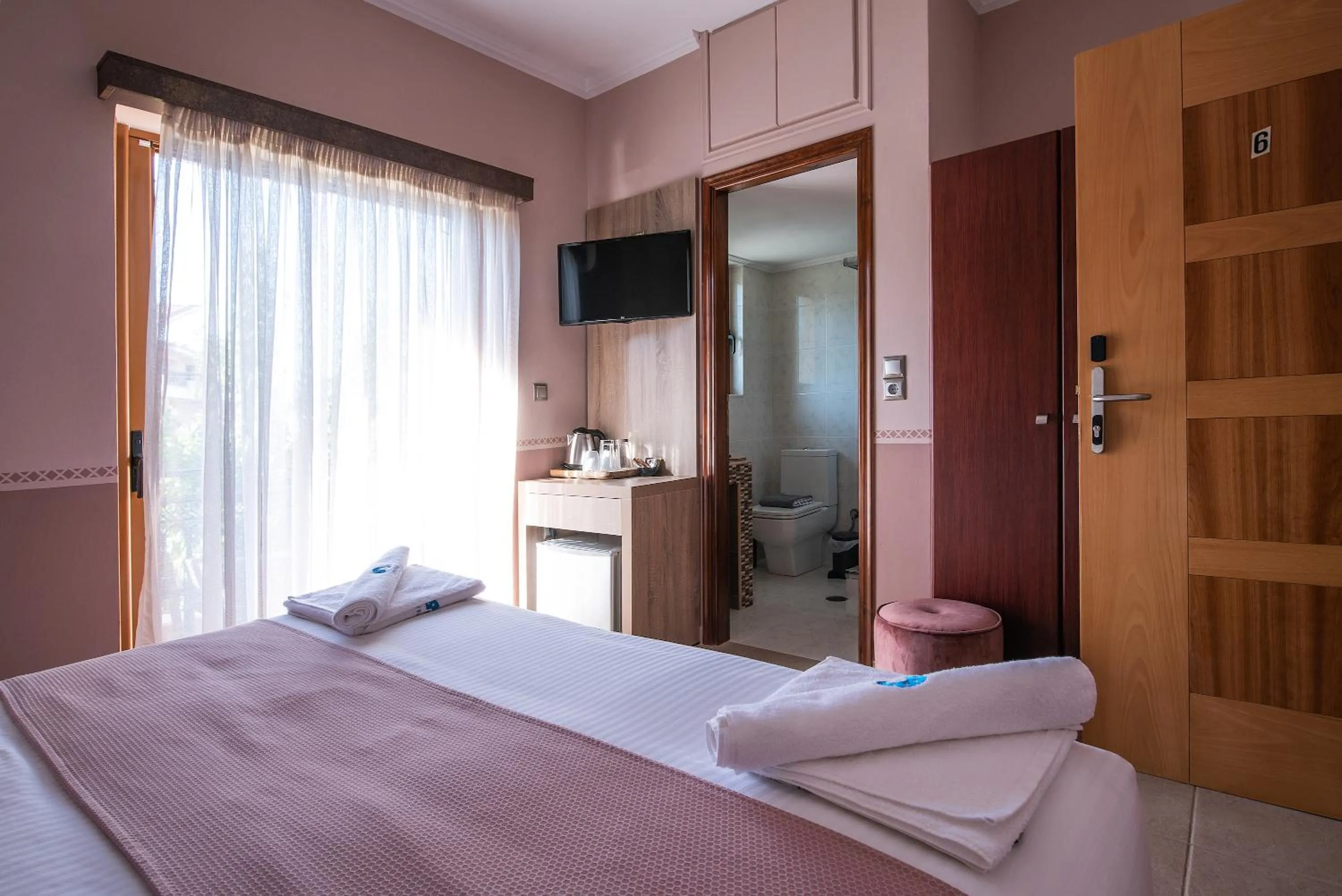 Bed in Cyrenia Guesthouse