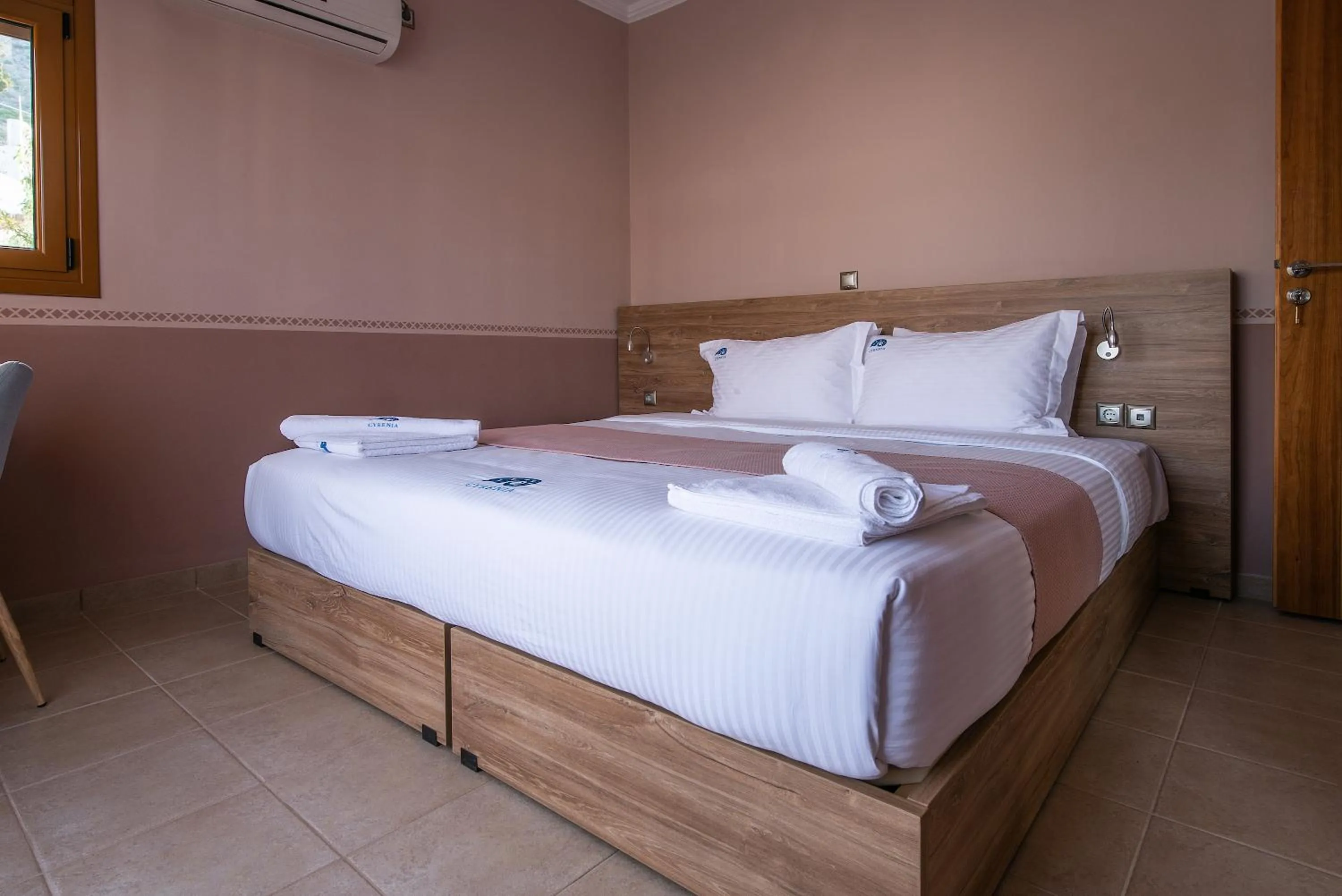 Bed in Cyrenia Guesthouse