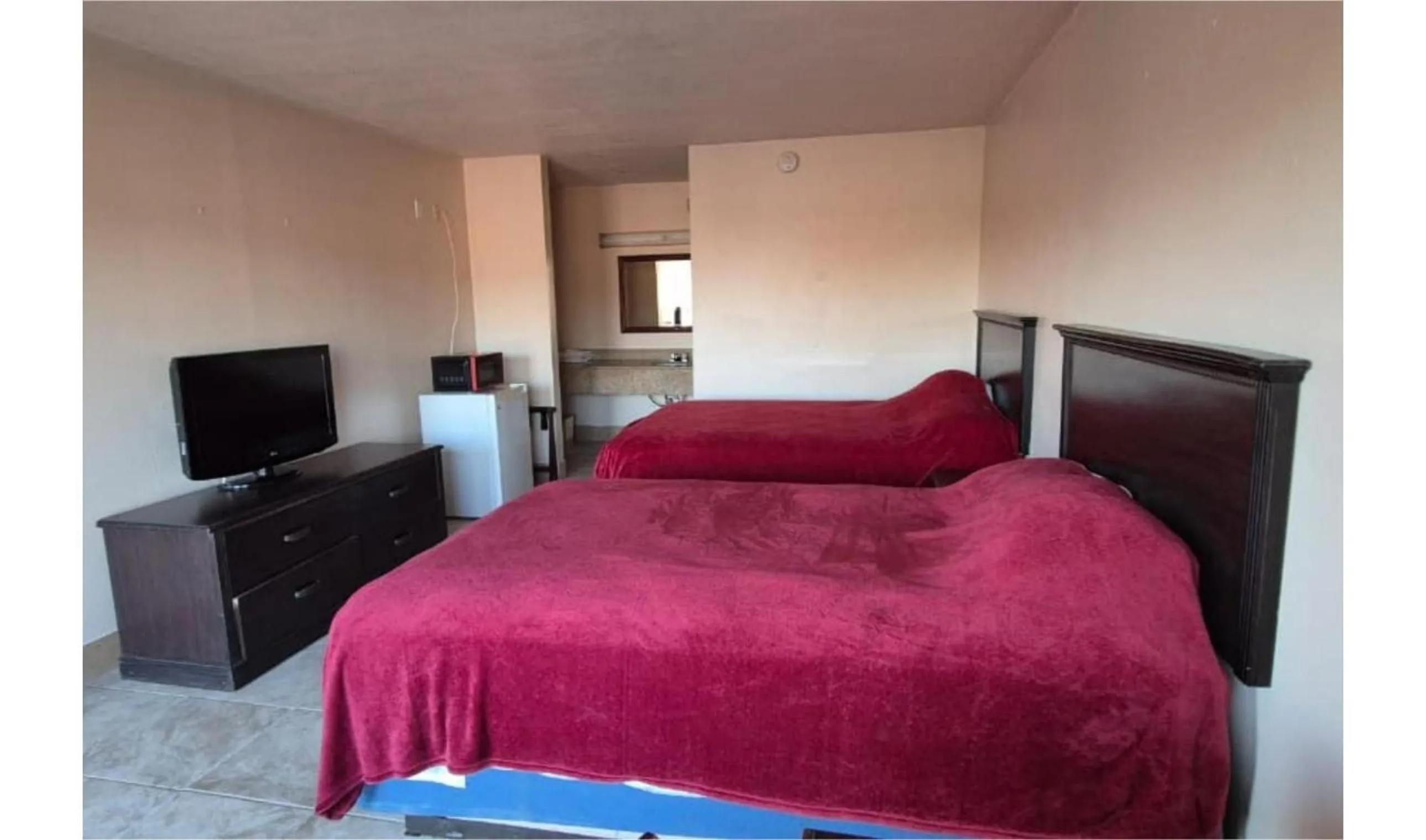 Bedroom, Bed in Central Motel Kissimmee Near Disney World