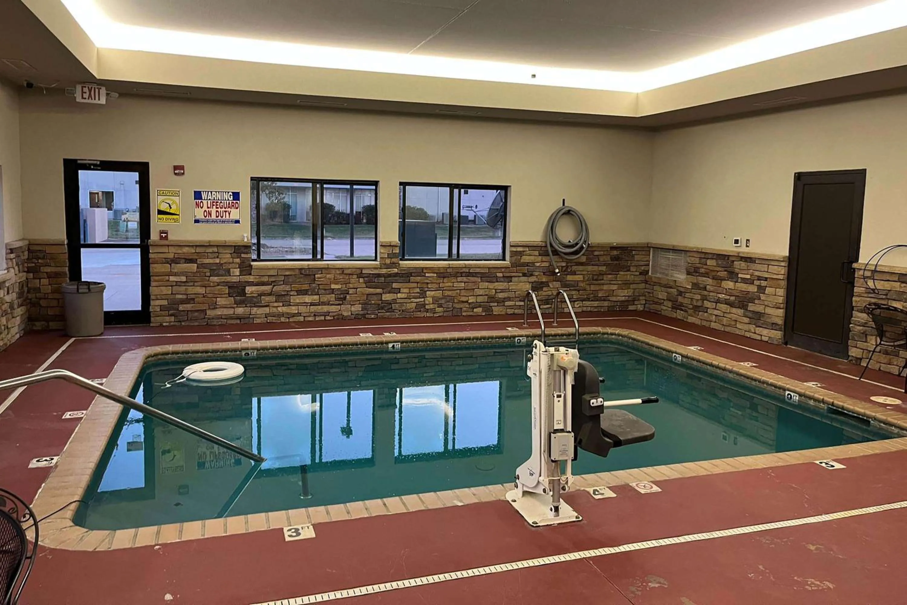 Swimming pool in SureStay Plus Hotel by Best Western Coffeyville