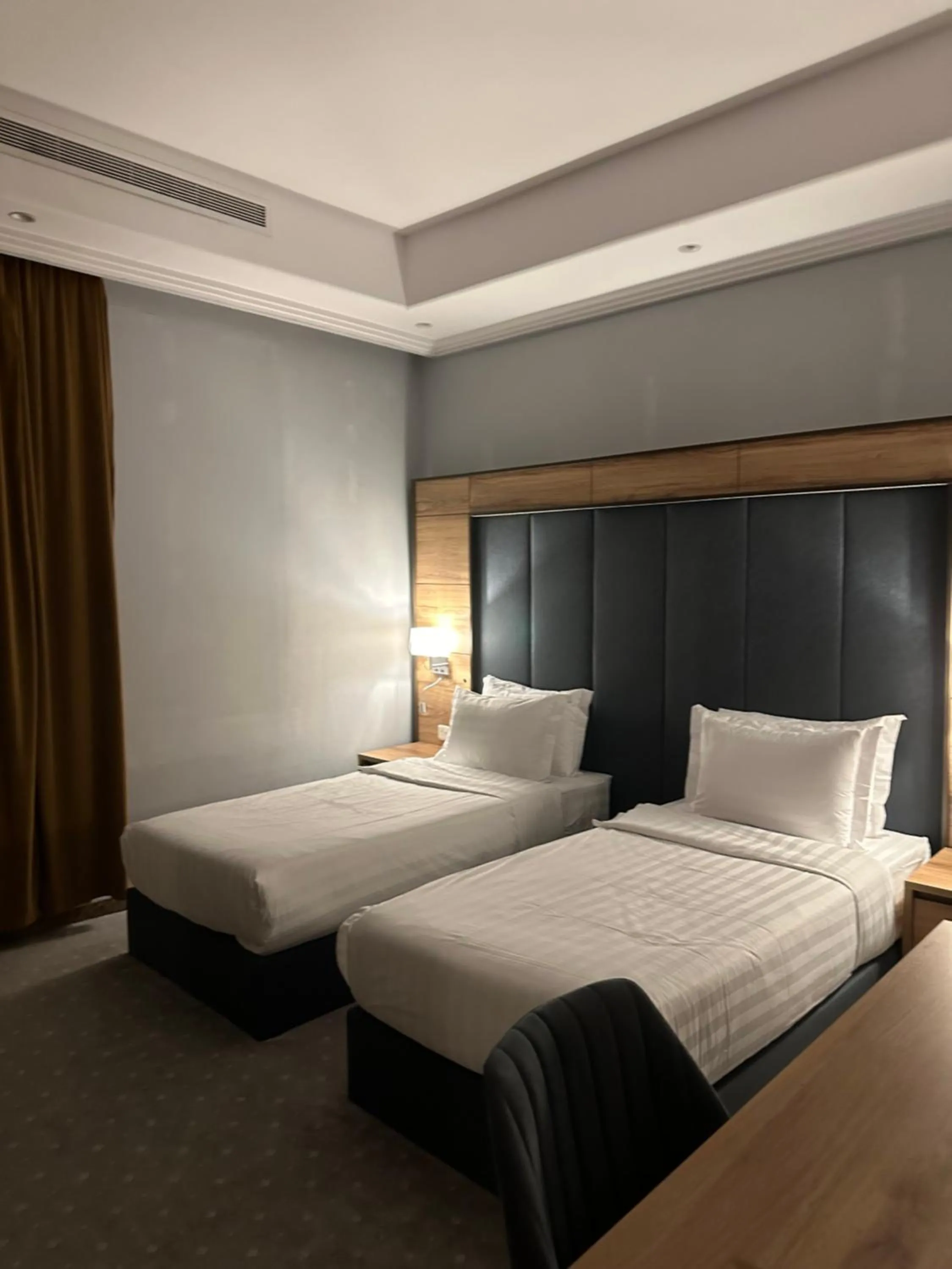 Bed in لافنت بارك للشقق المخدومة - إقتصادي