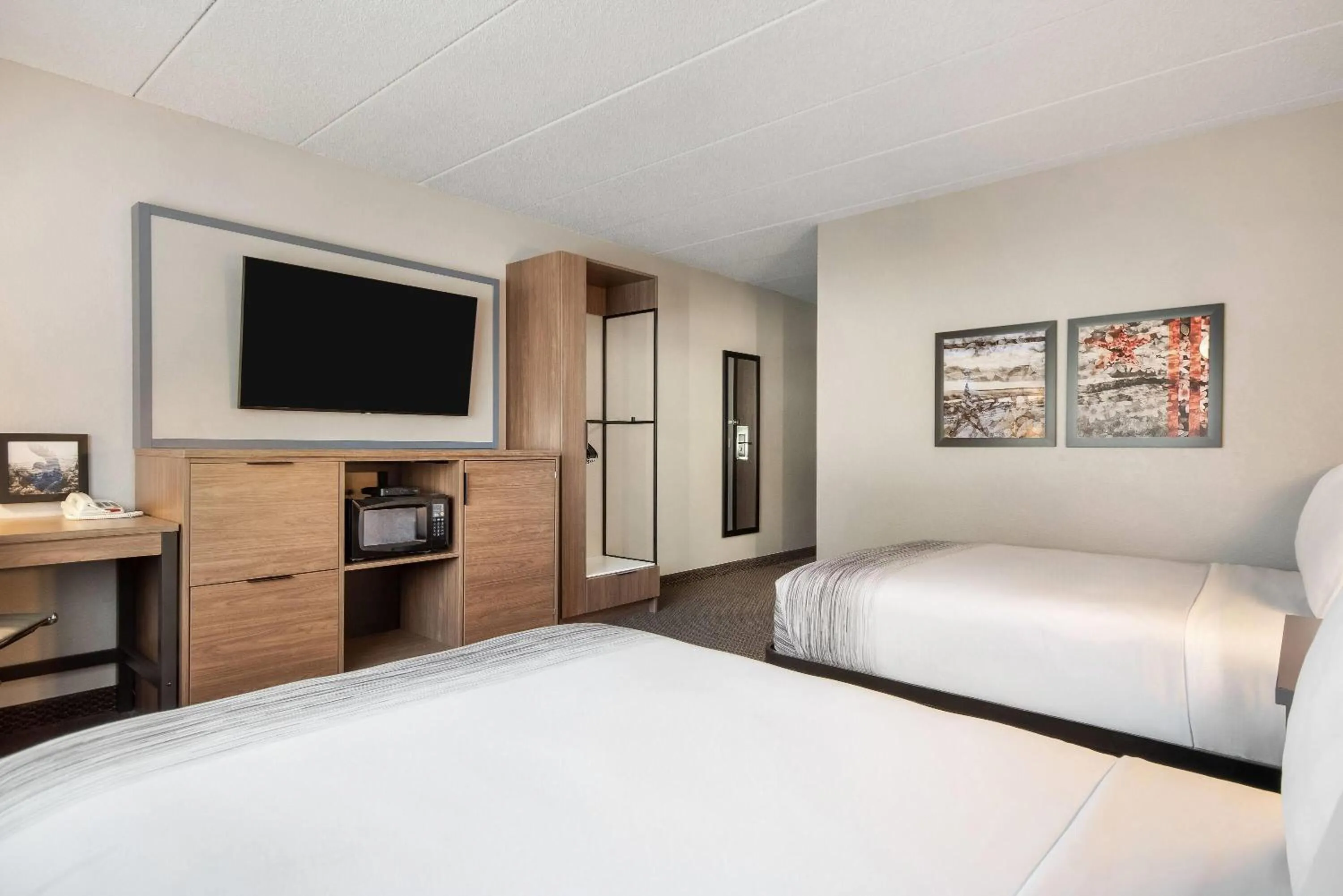 Bed in AmericInn by Wyndham St. Peter