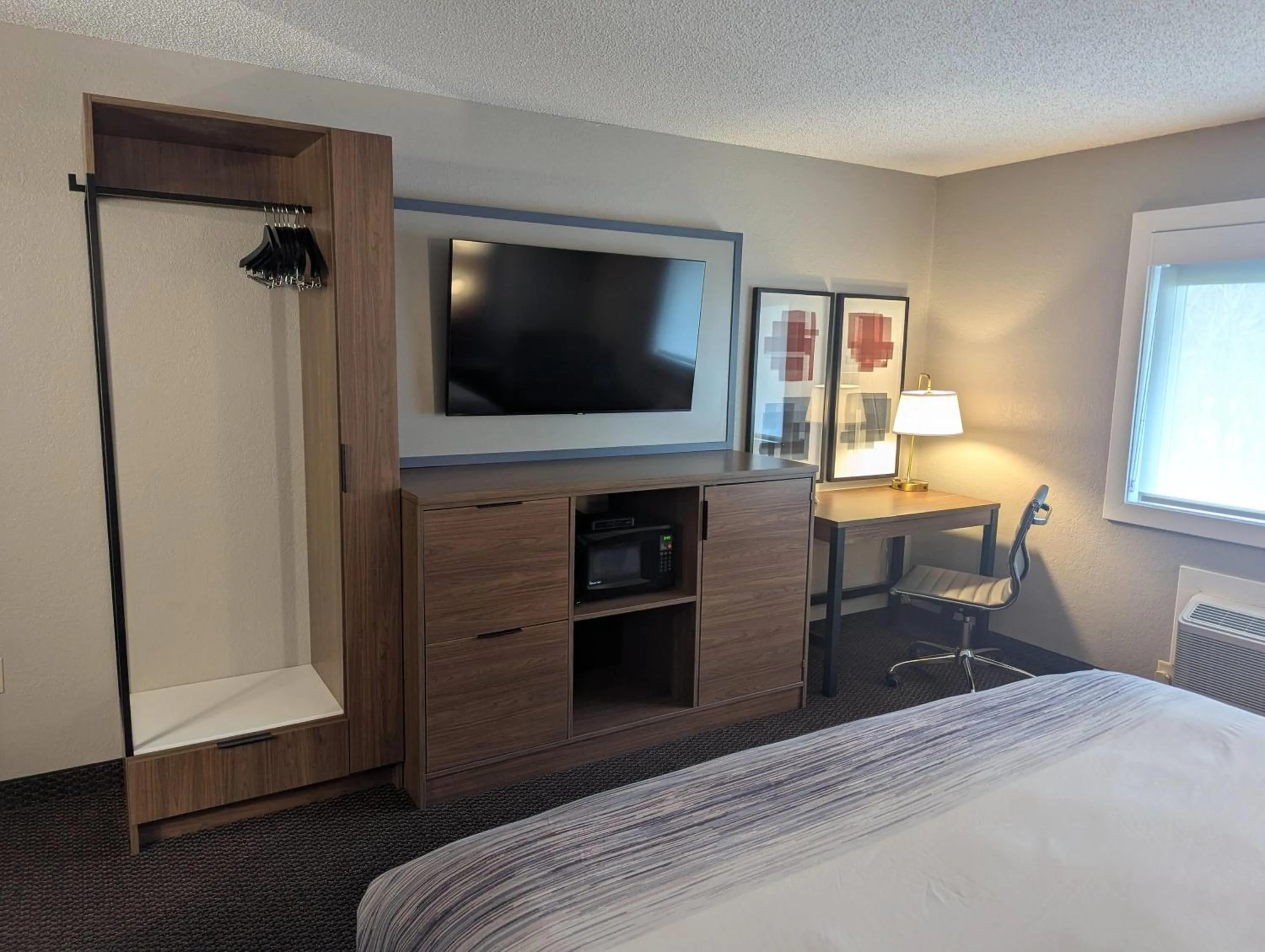 Photo of the whole room, Bed in AmericInn by Wyndham St. Peter