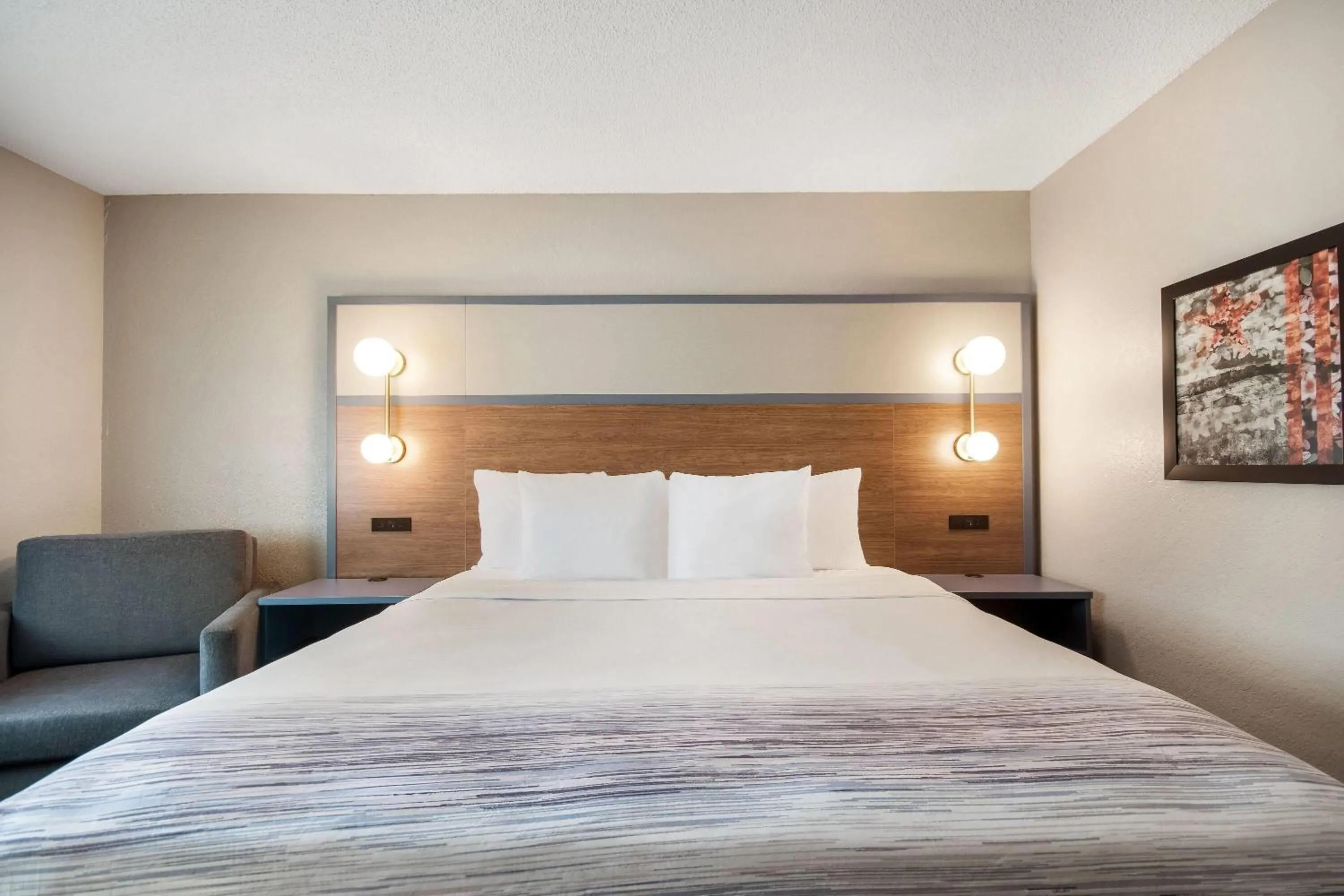 Bed in AmericInn by Wyndham St. Peter