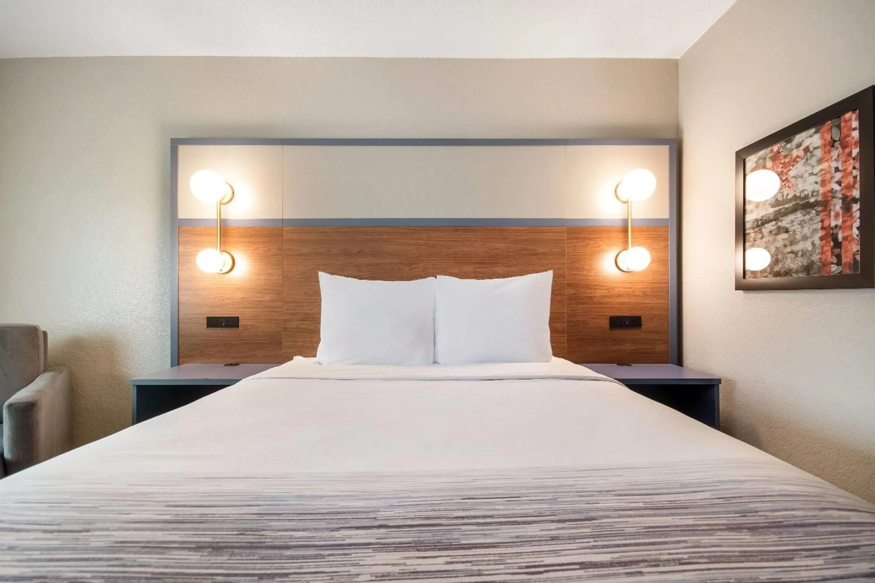 Bed in AmericInn by Wyndham St. Peter