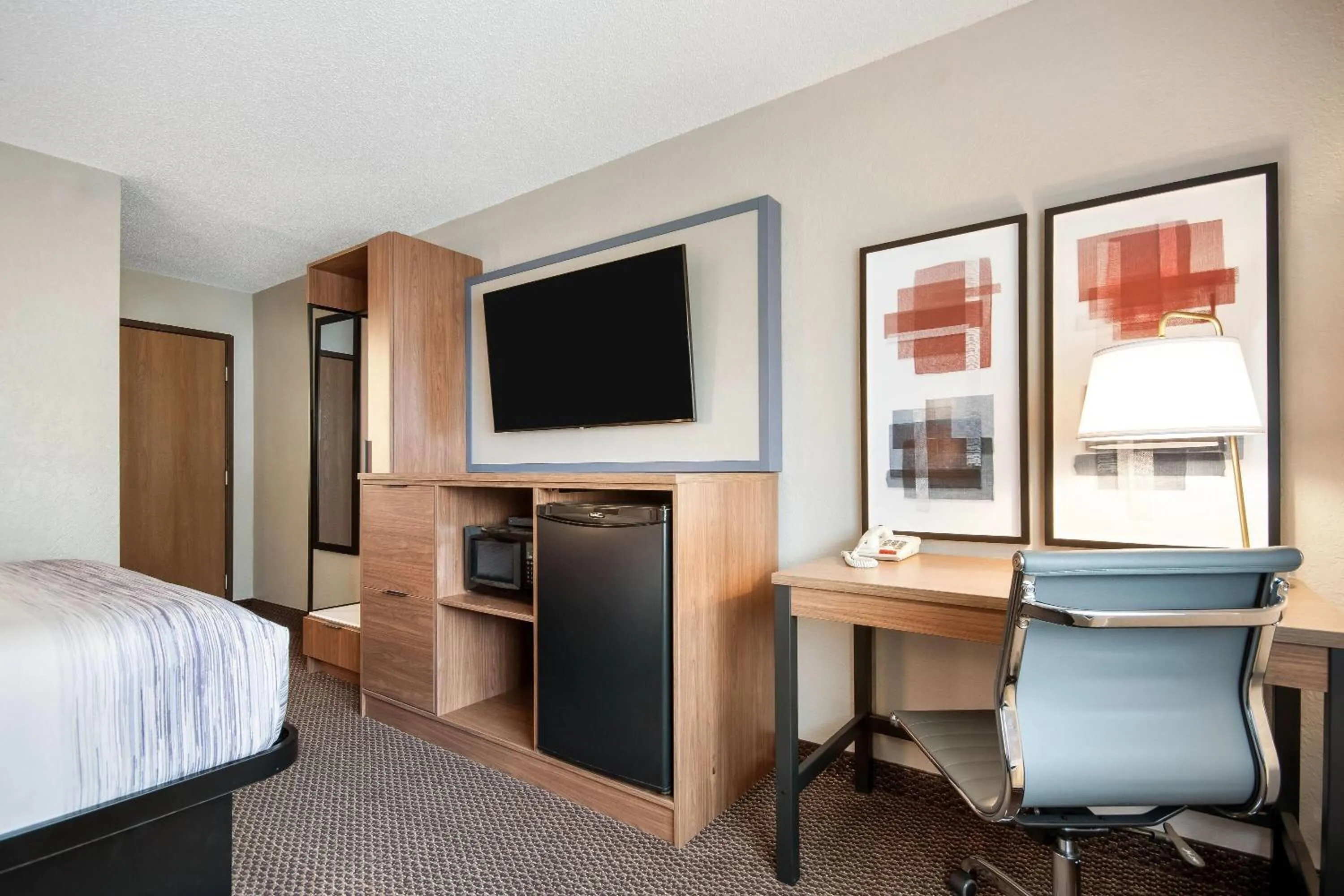 Bed in AmericInn by Wyndham St. Peter