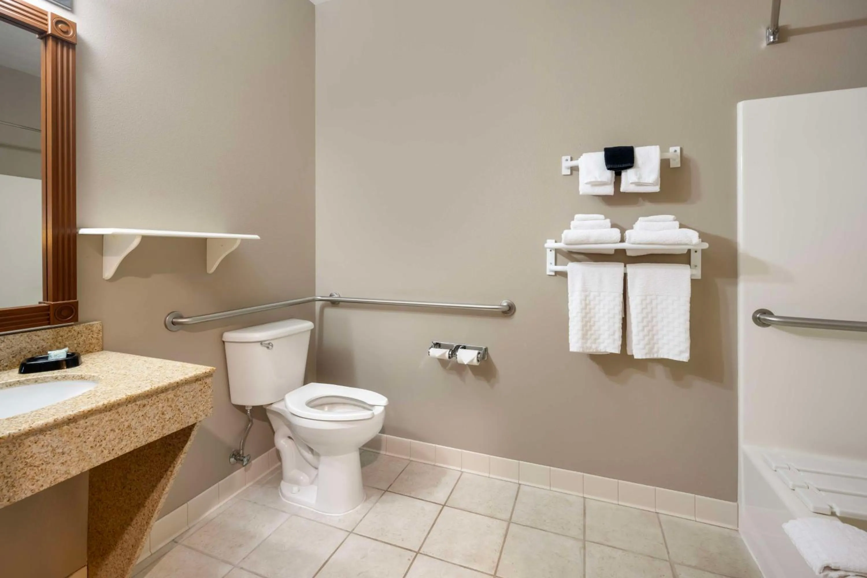 Toilet in Best Western Wheatland Inn