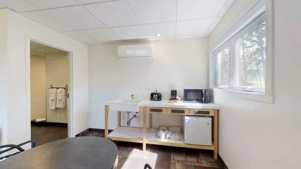 Kitchen or kitchenette in Manoir Belle Plage