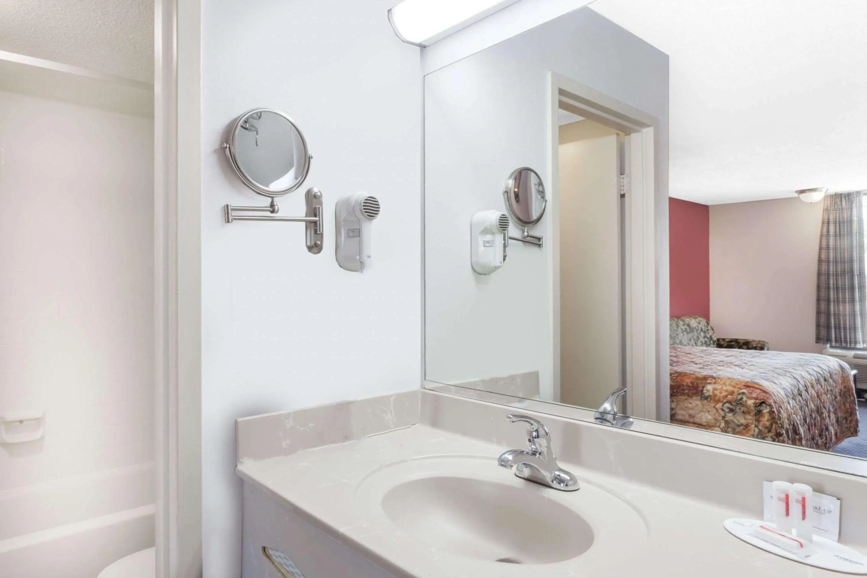 Bathroom, Bed in Days Inn by Wyndham Martin