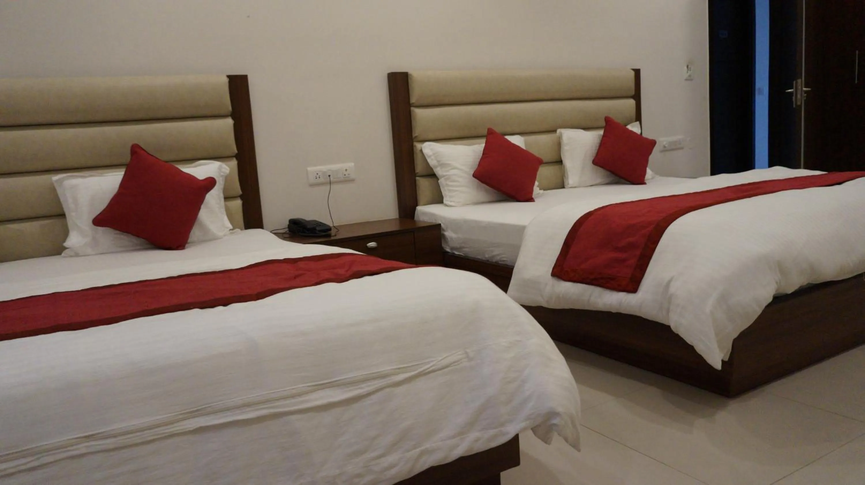 Bed in Hotel Aakash Residency