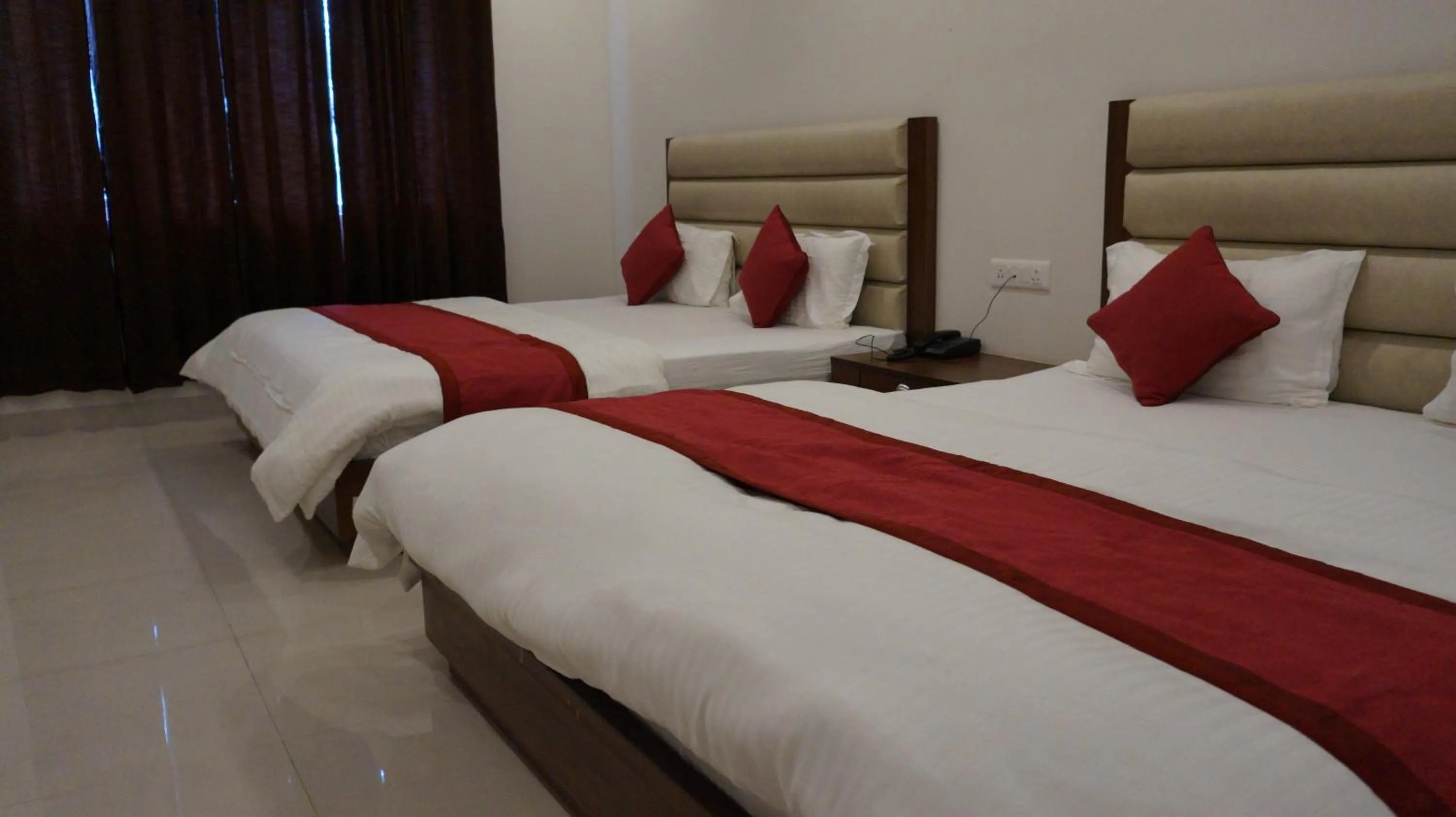 Bed in Hotel Aakash Residency