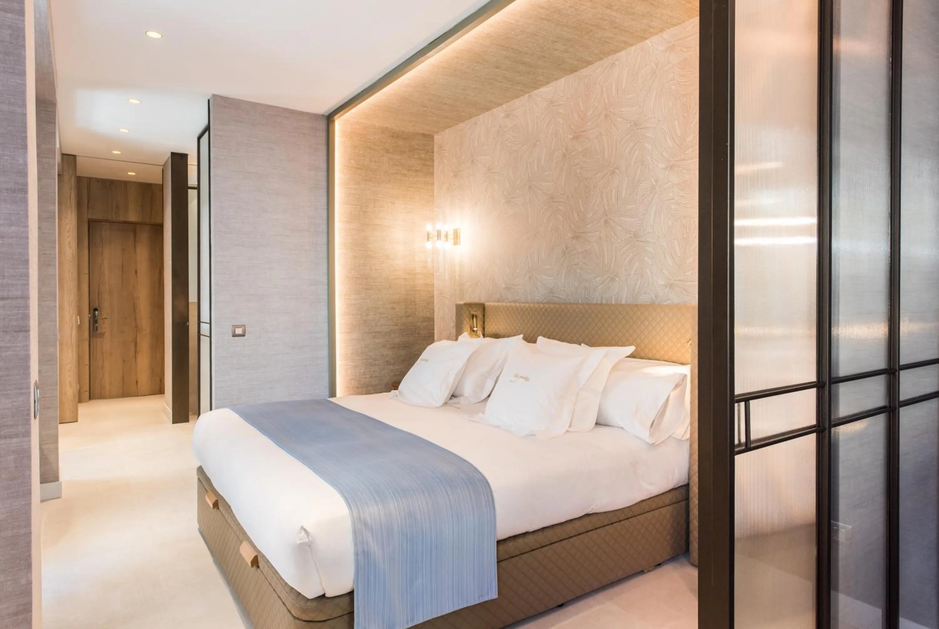 Bed in The Garden Suites