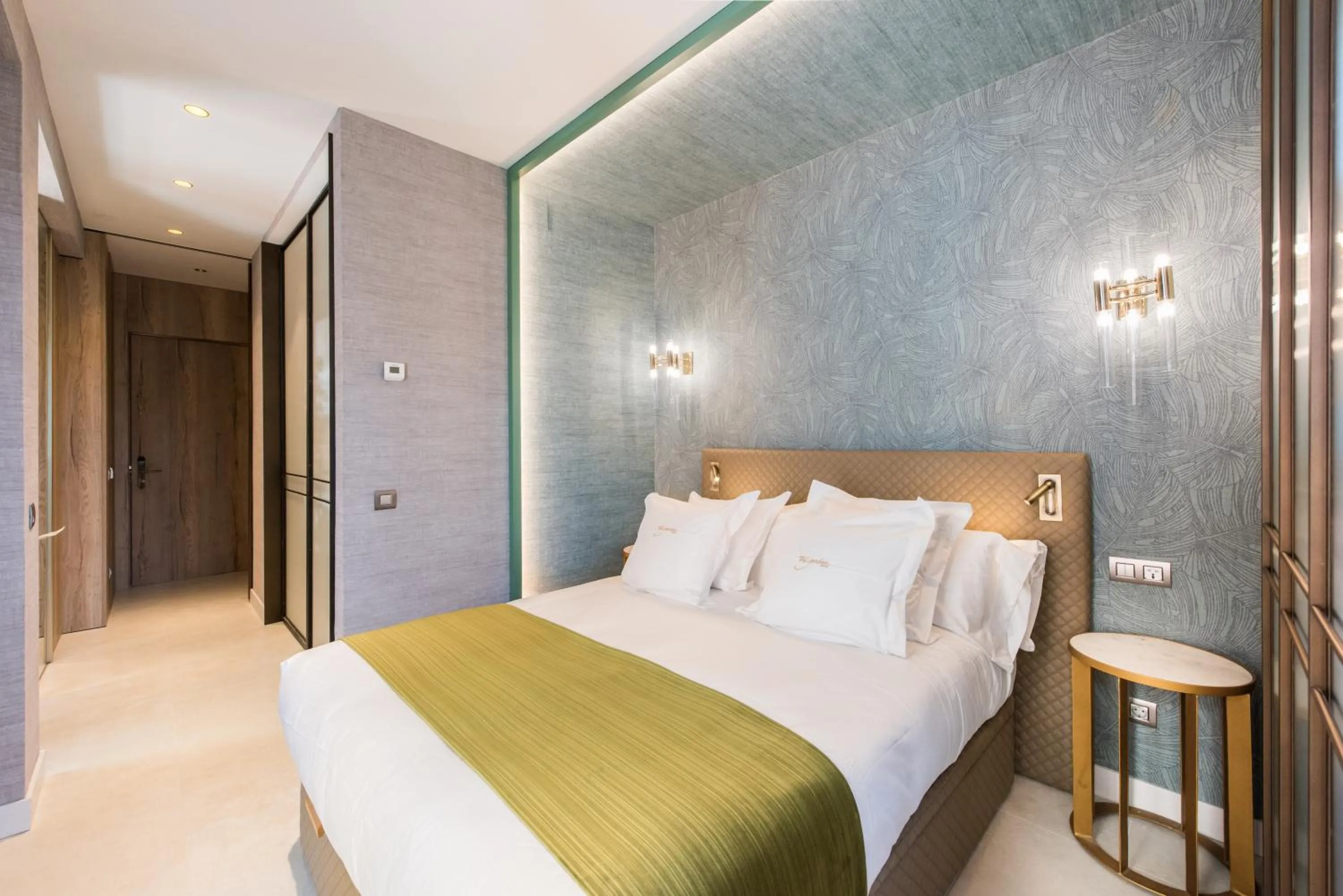 Bed in The Garden Suites