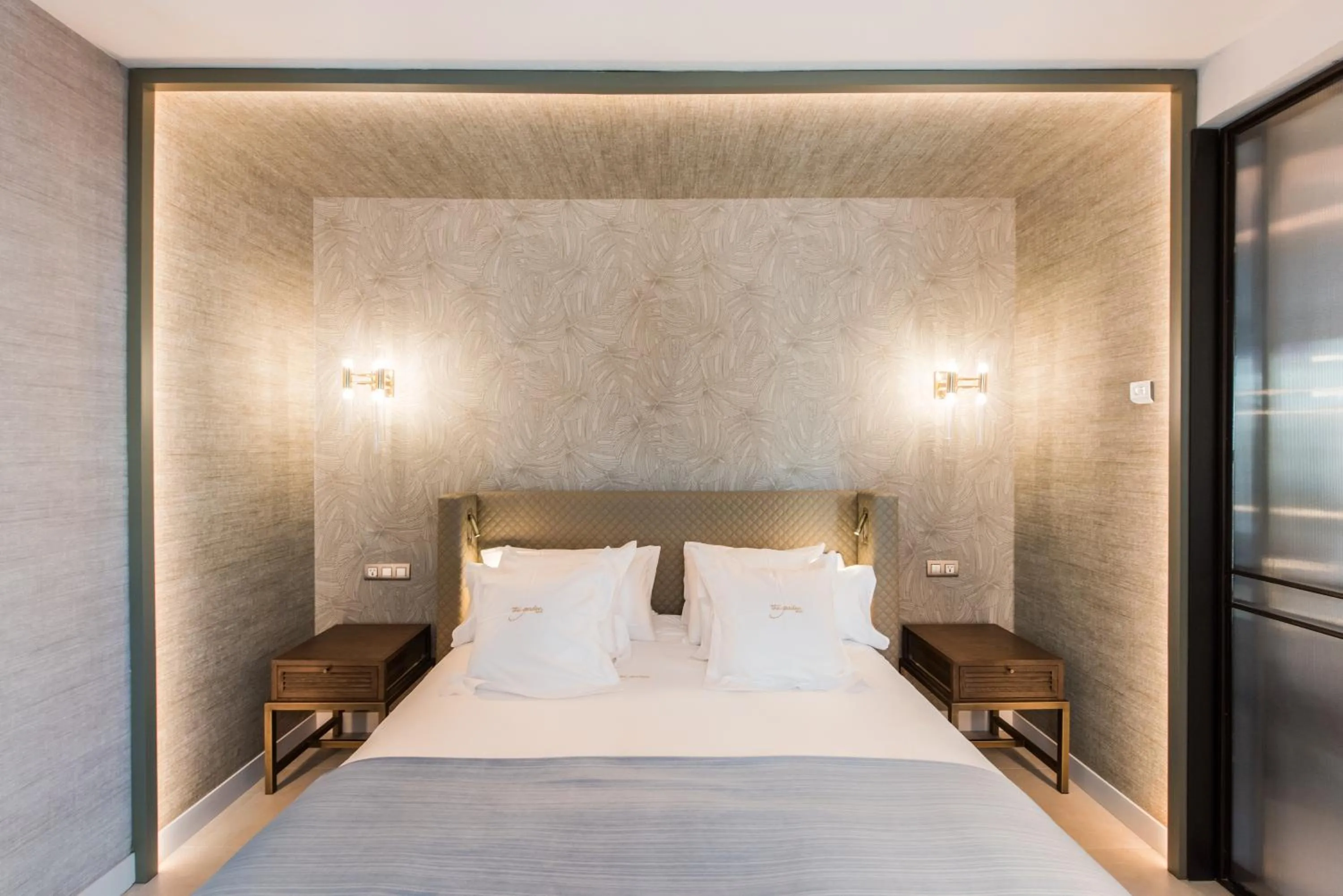 Bed in The Garden Suites