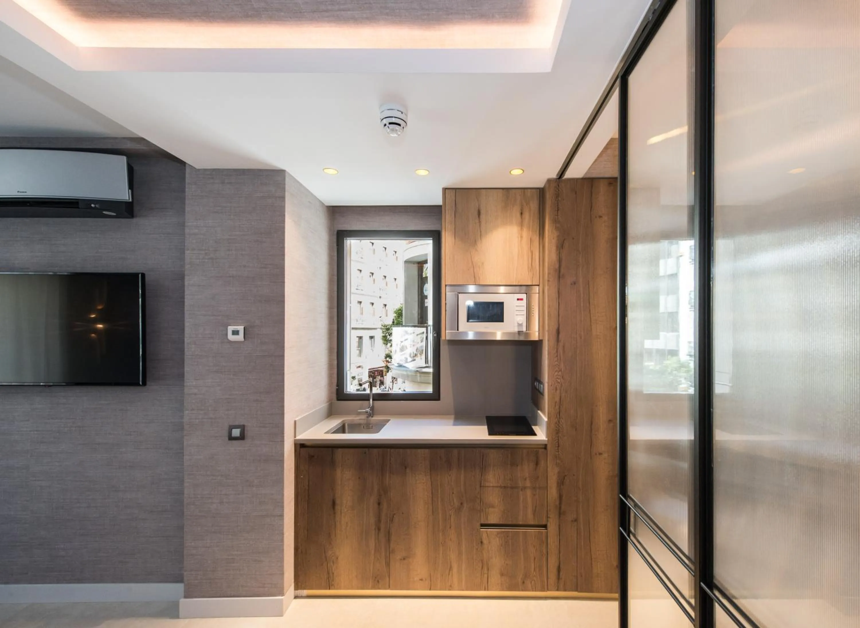 Kitchen or kitchenette in The Garden Suites