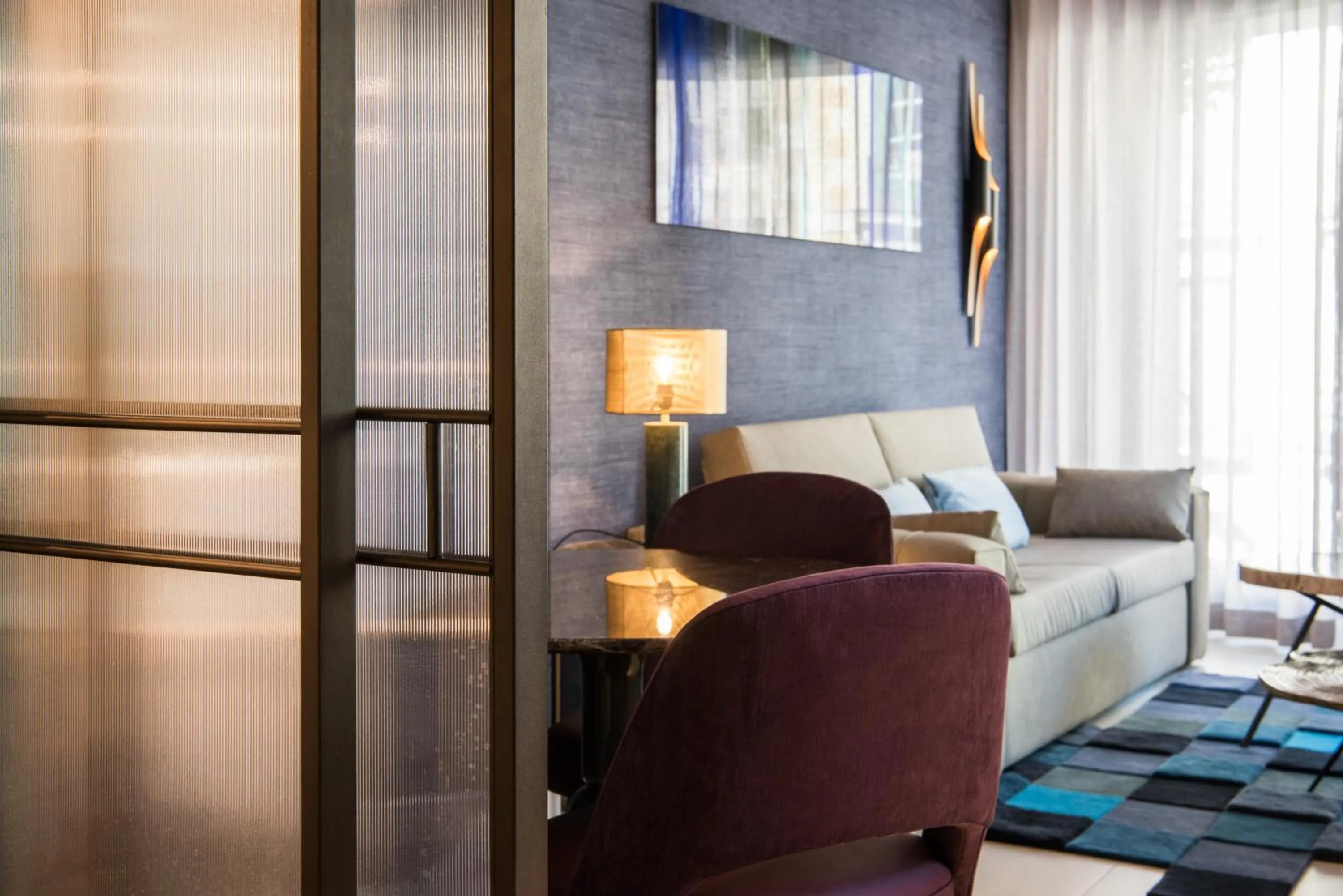 Living room, Bed in The Garden Suites