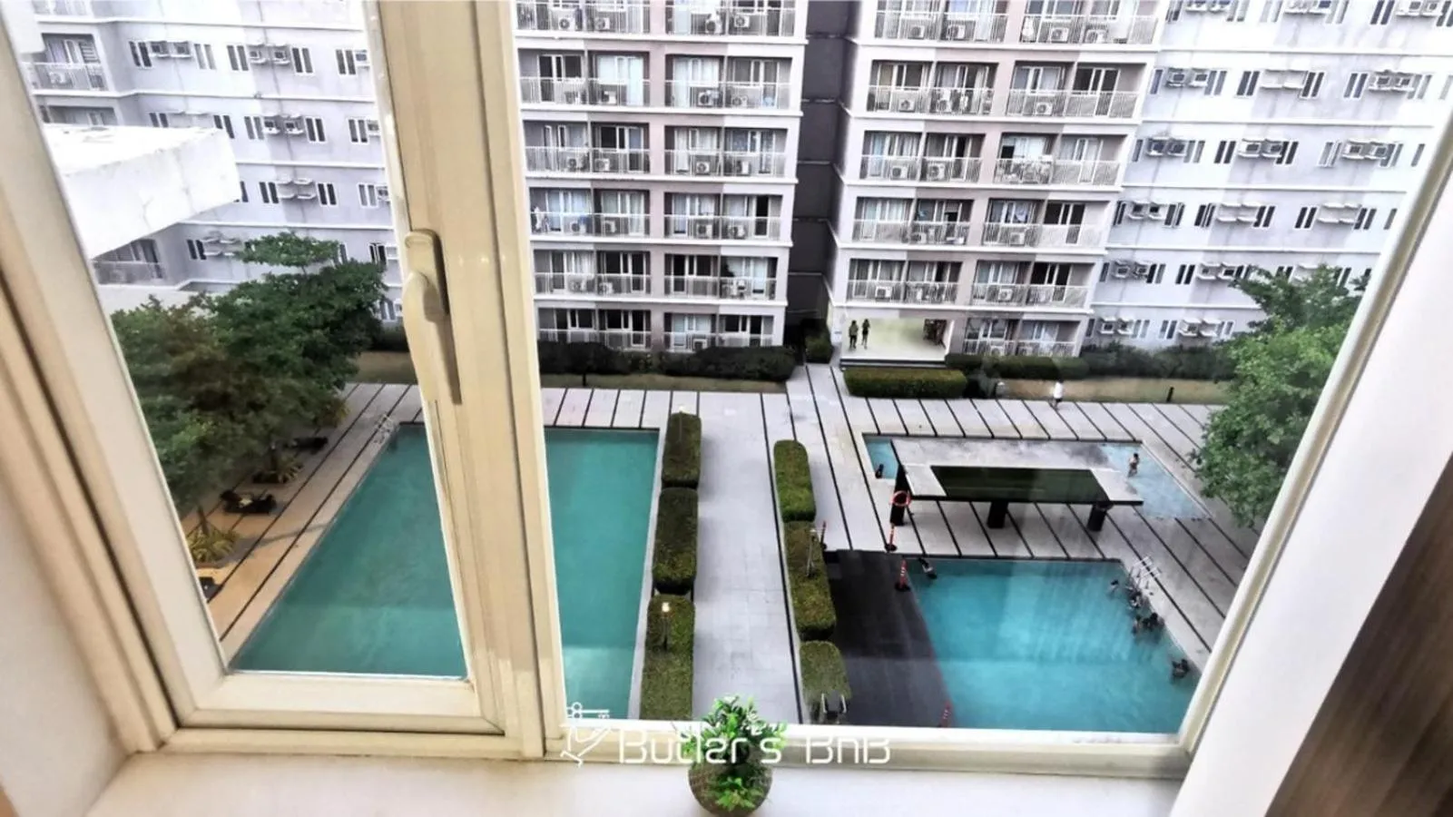 Pool view in Butler's BnB @ Trees Residences QC Phil