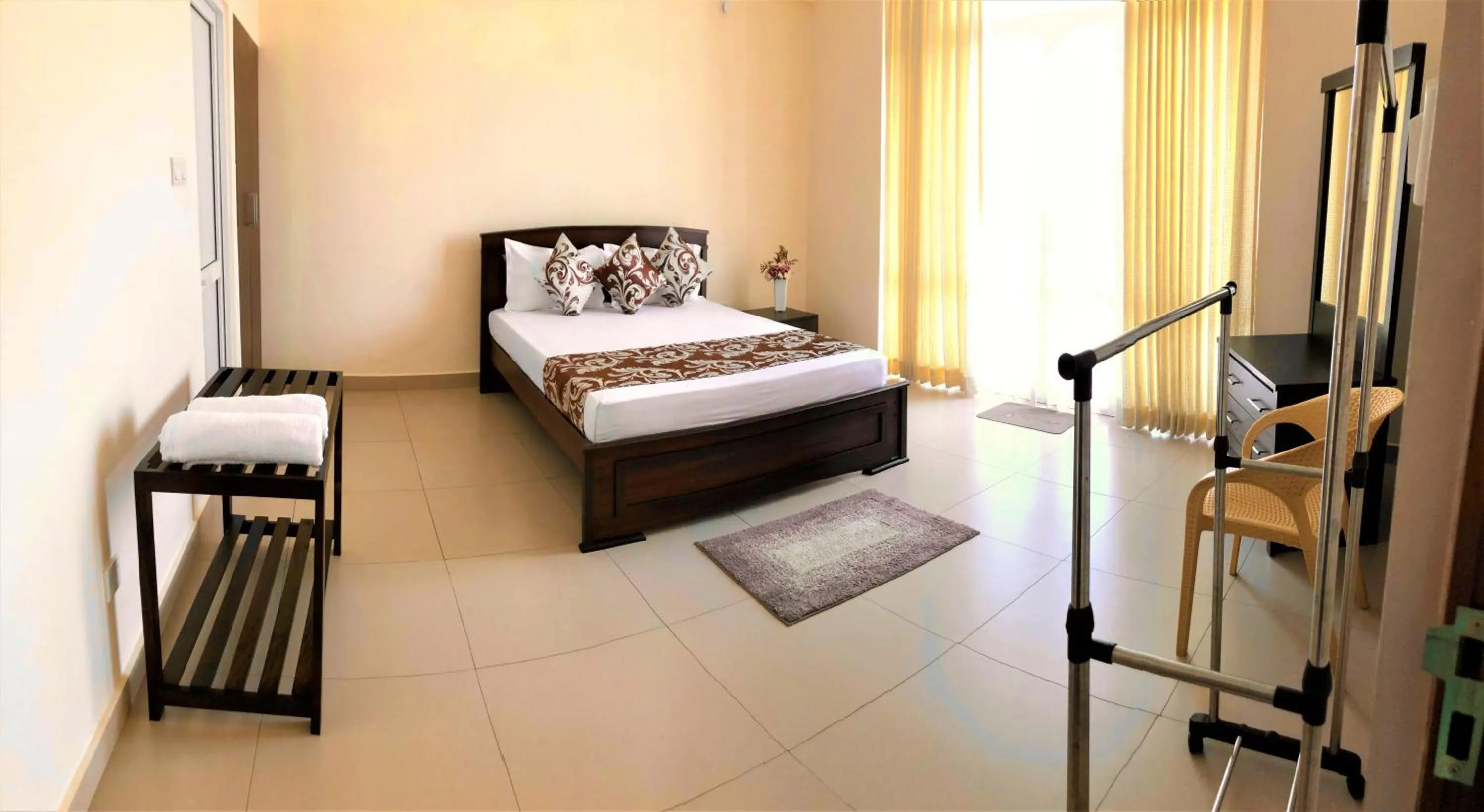 Bed in VIVAS Residencies Luxury Apartments