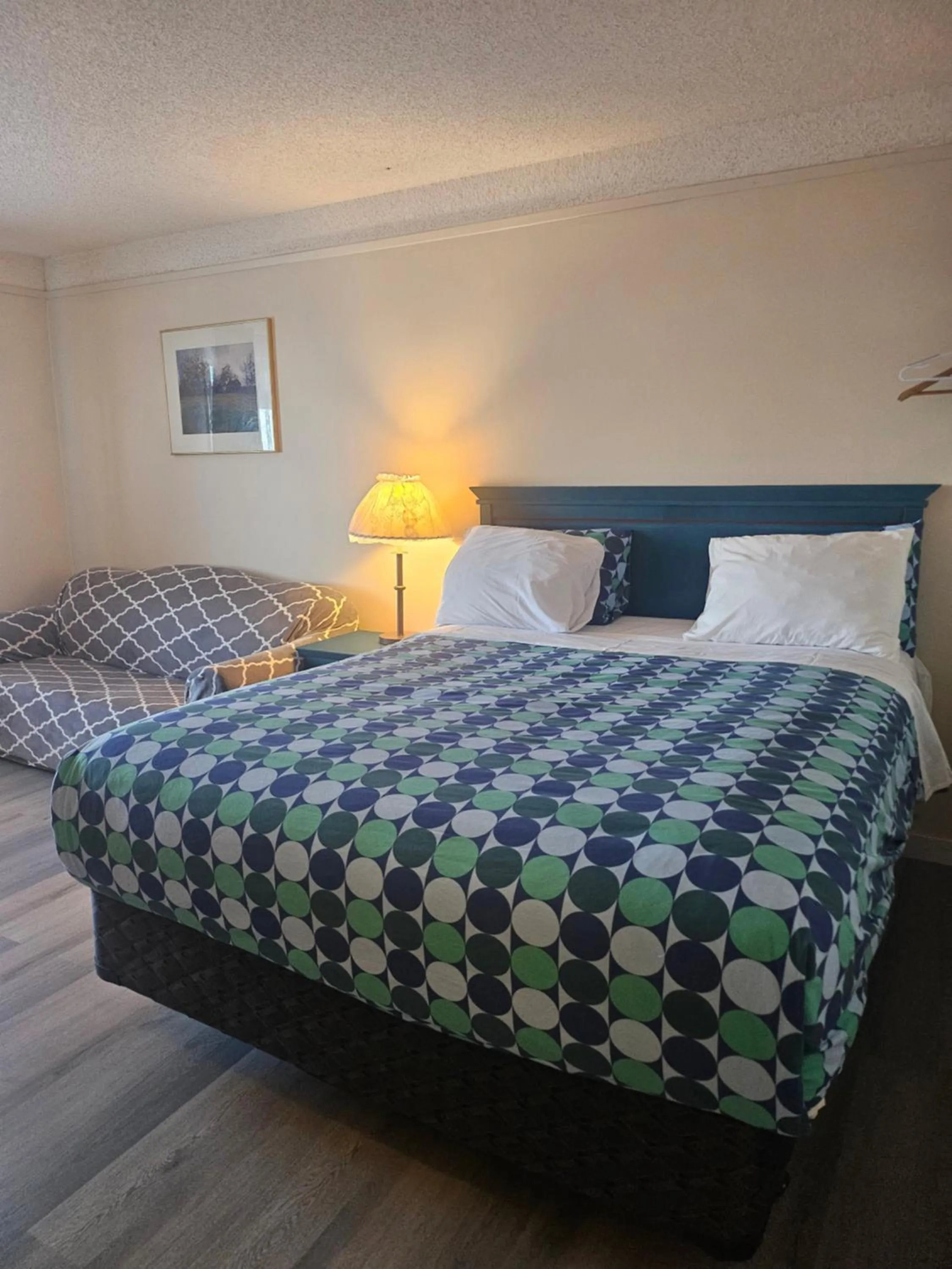 Bed in Moosomin Country Squire Inn