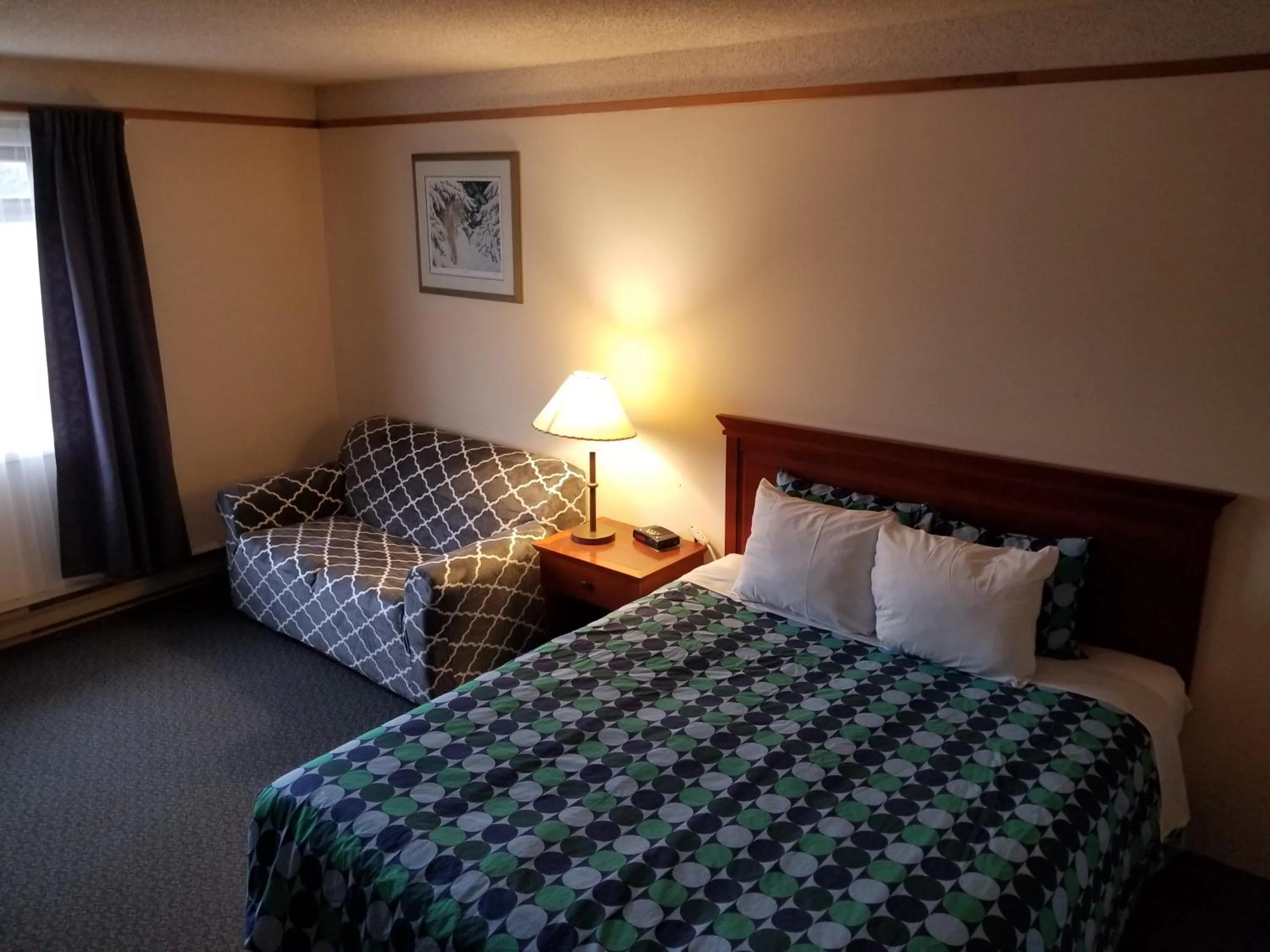 Bed in Moosomin Country Squire Inn