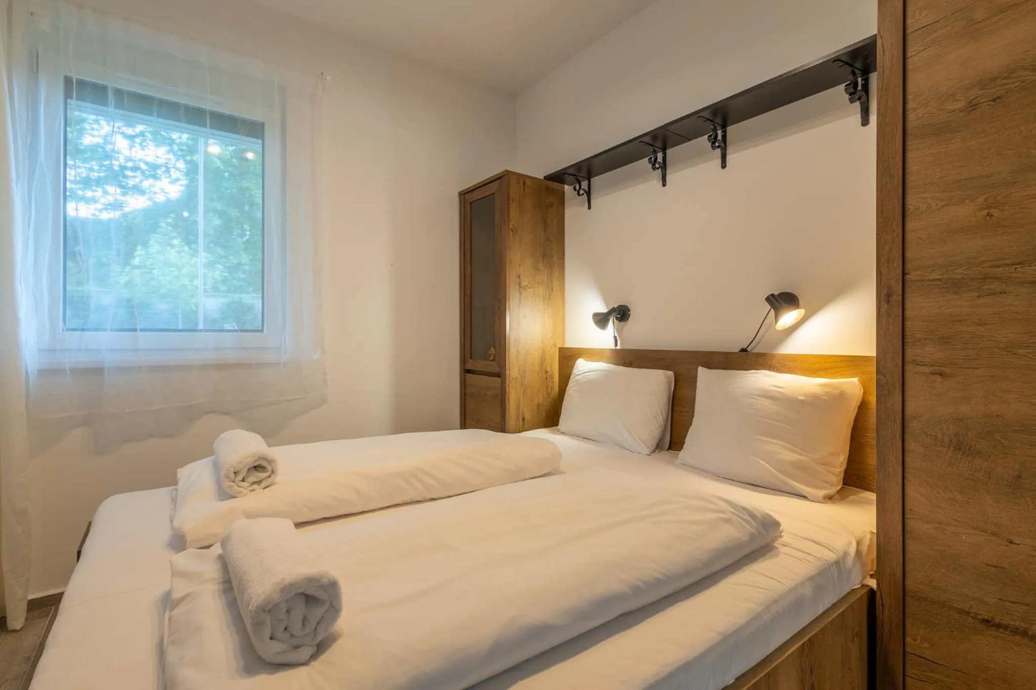 Bed in Casa Luxury Wellness Apartman By BLTN