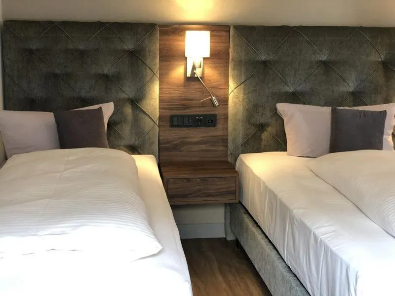 Photo of the whole room, Bed in Intergroup Business & Design Hotel Ingolstadt