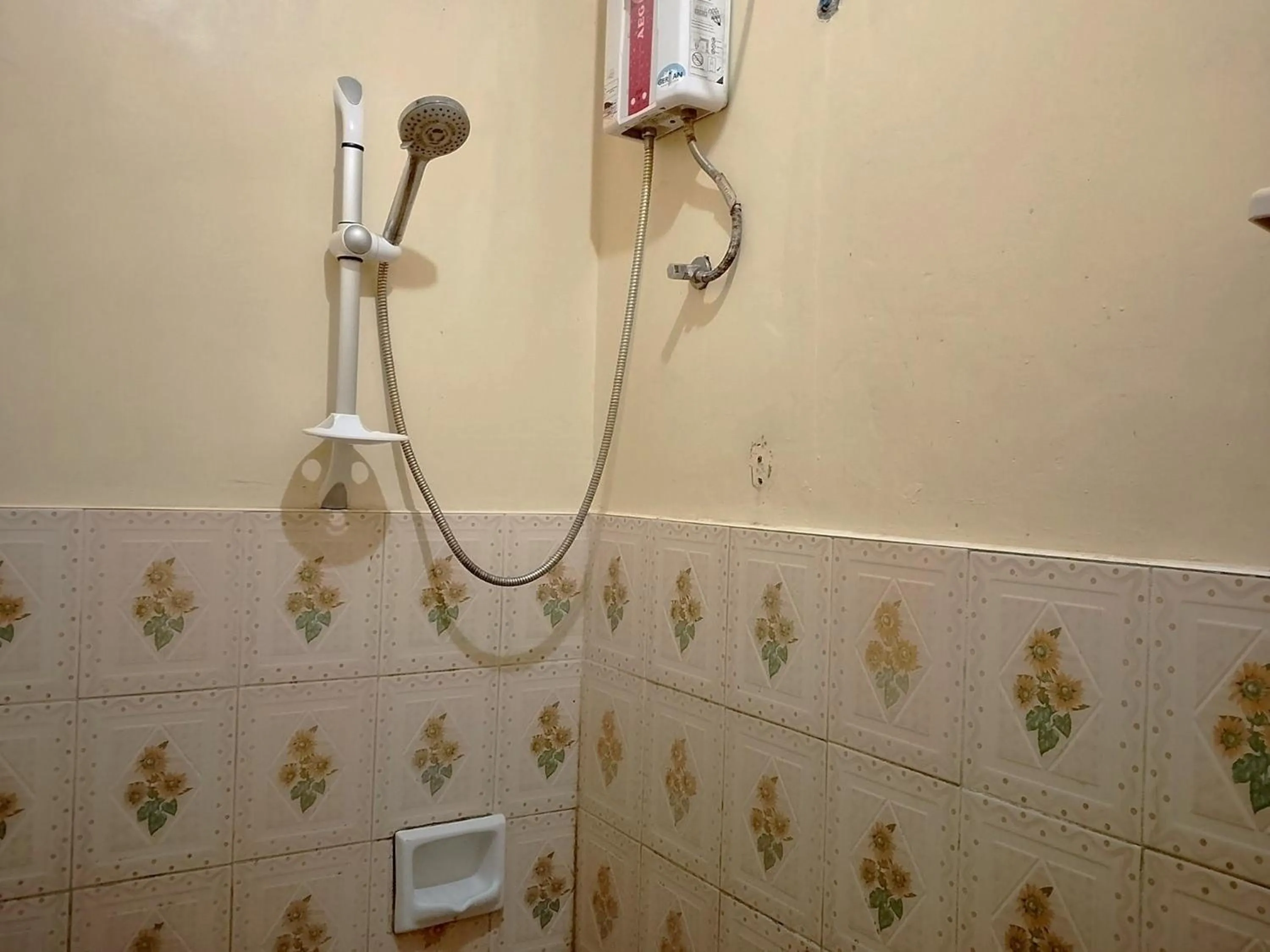 Shower in July's Haven Seaside Pension Camiguin