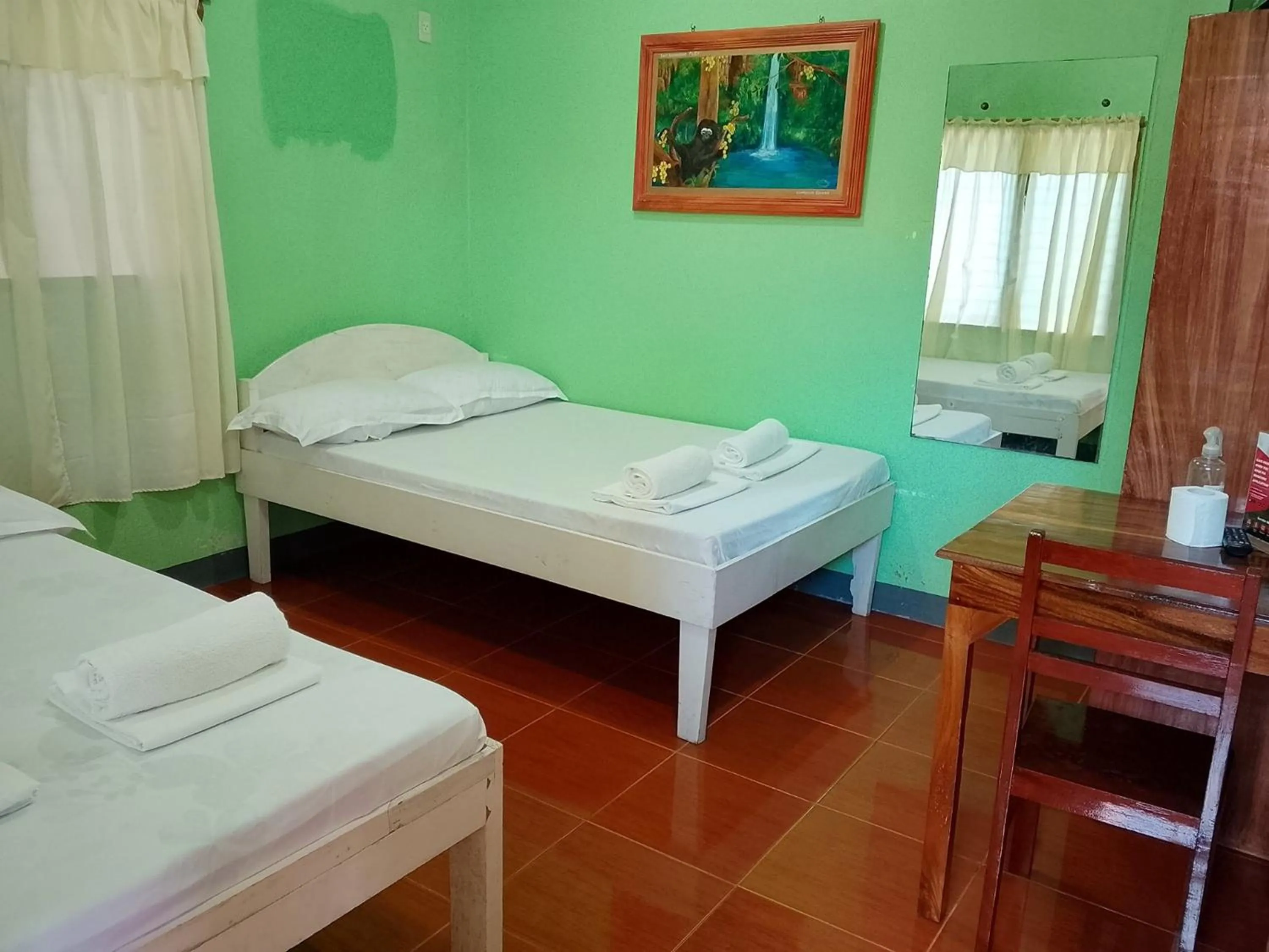 Bedroom, Bed in July's Haven Seaside Pension Camiguin
