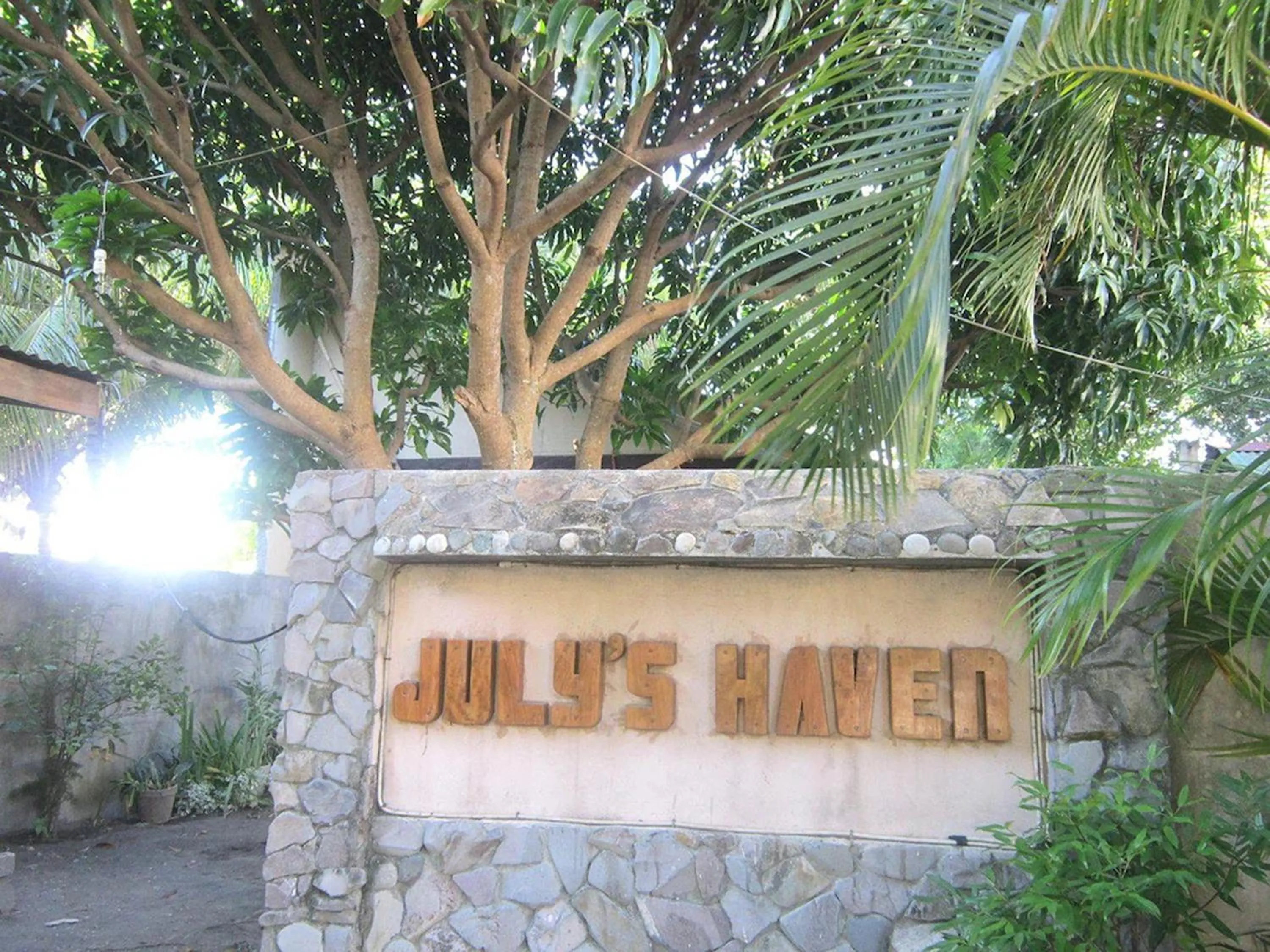 Property logo or sign in July's Haven Seaside Pension Camiguin