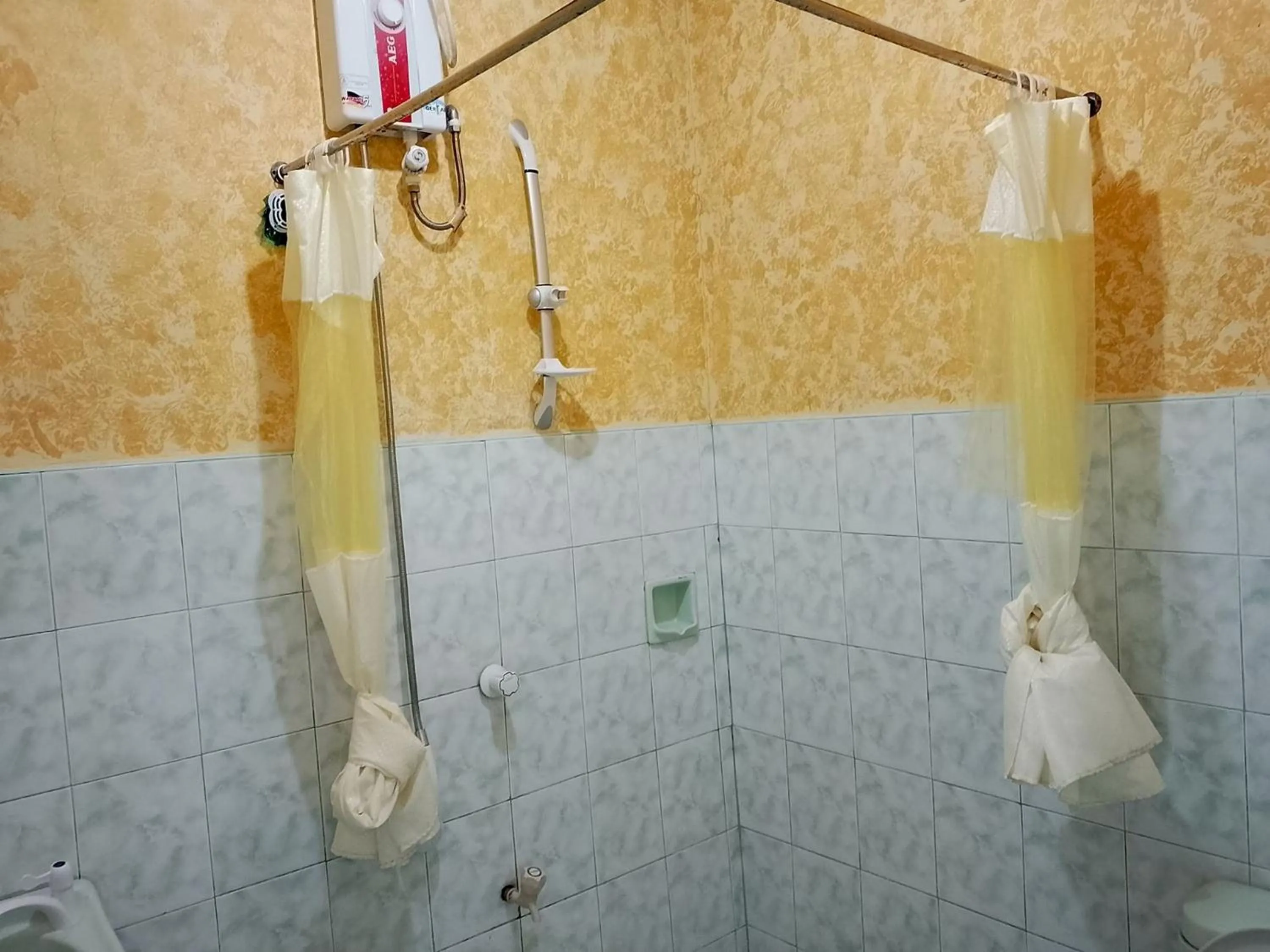 Bathroom in July's Haven Seaside Pension Camiguin