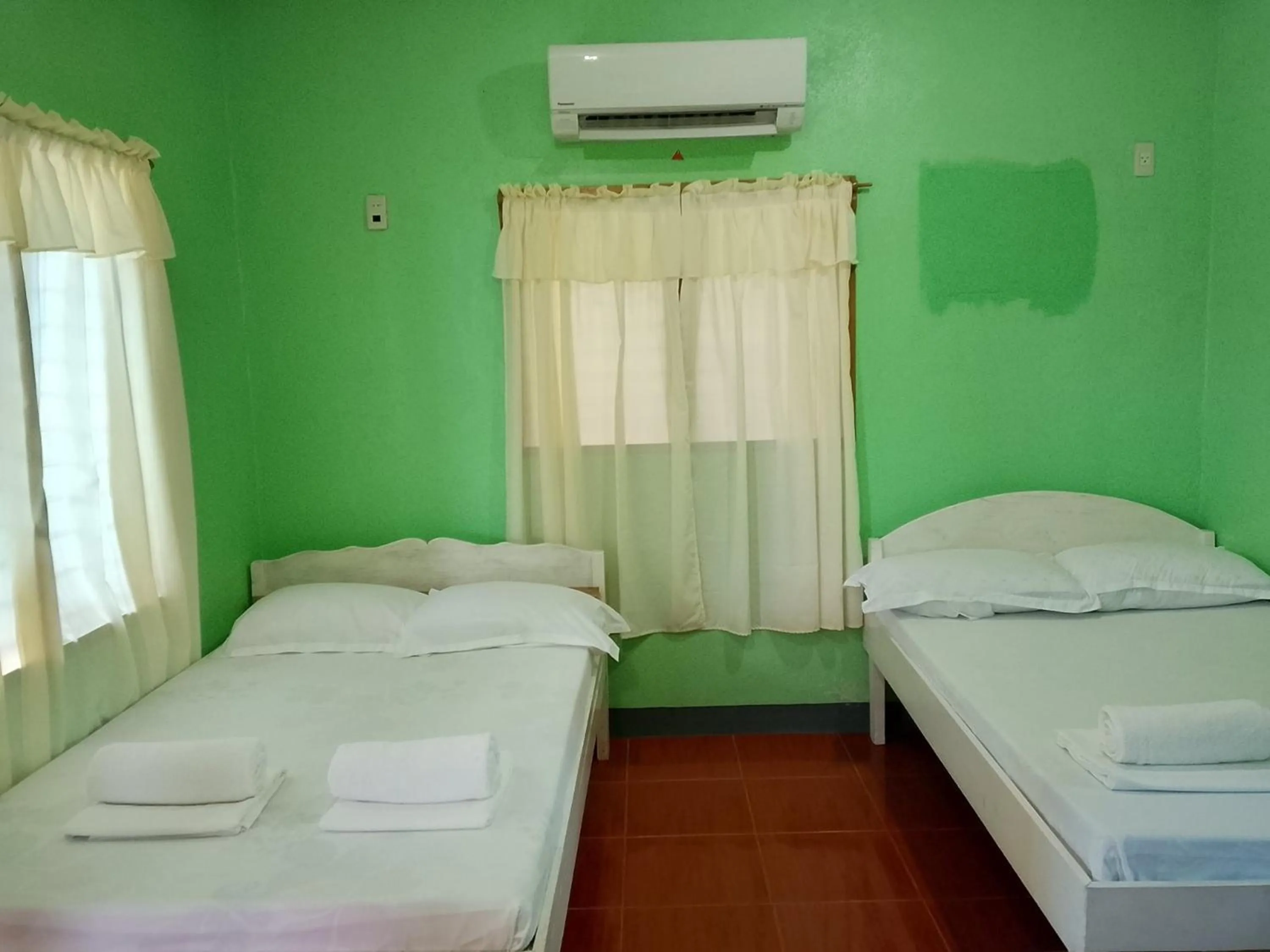 Bedroom, Bed in July's Haven Seaside Pension Camiguin