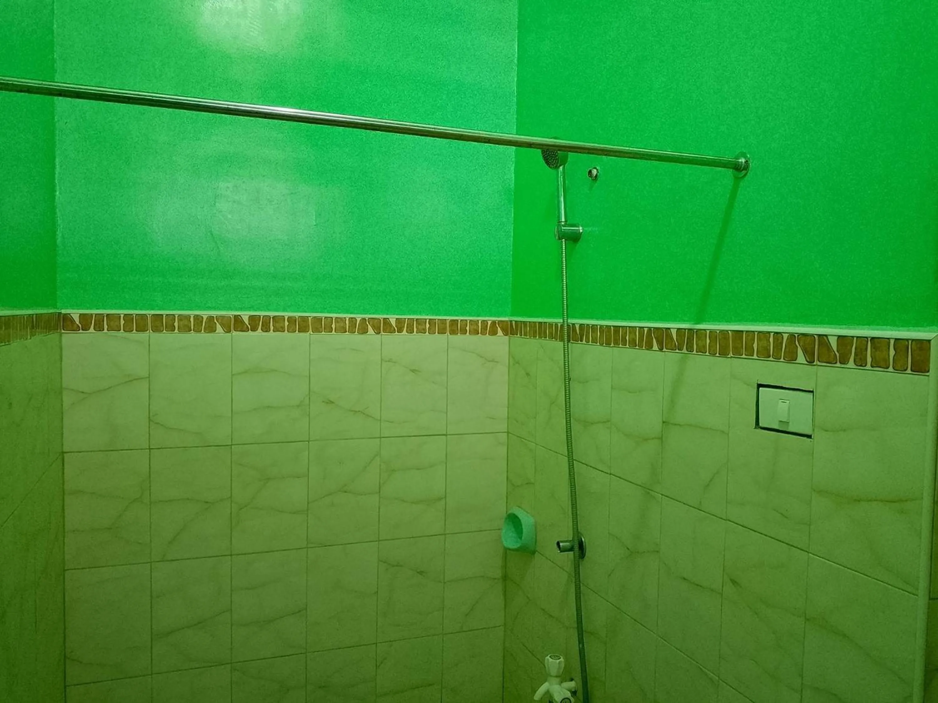 Shower in July's Haven Seaside Pension Camiguin