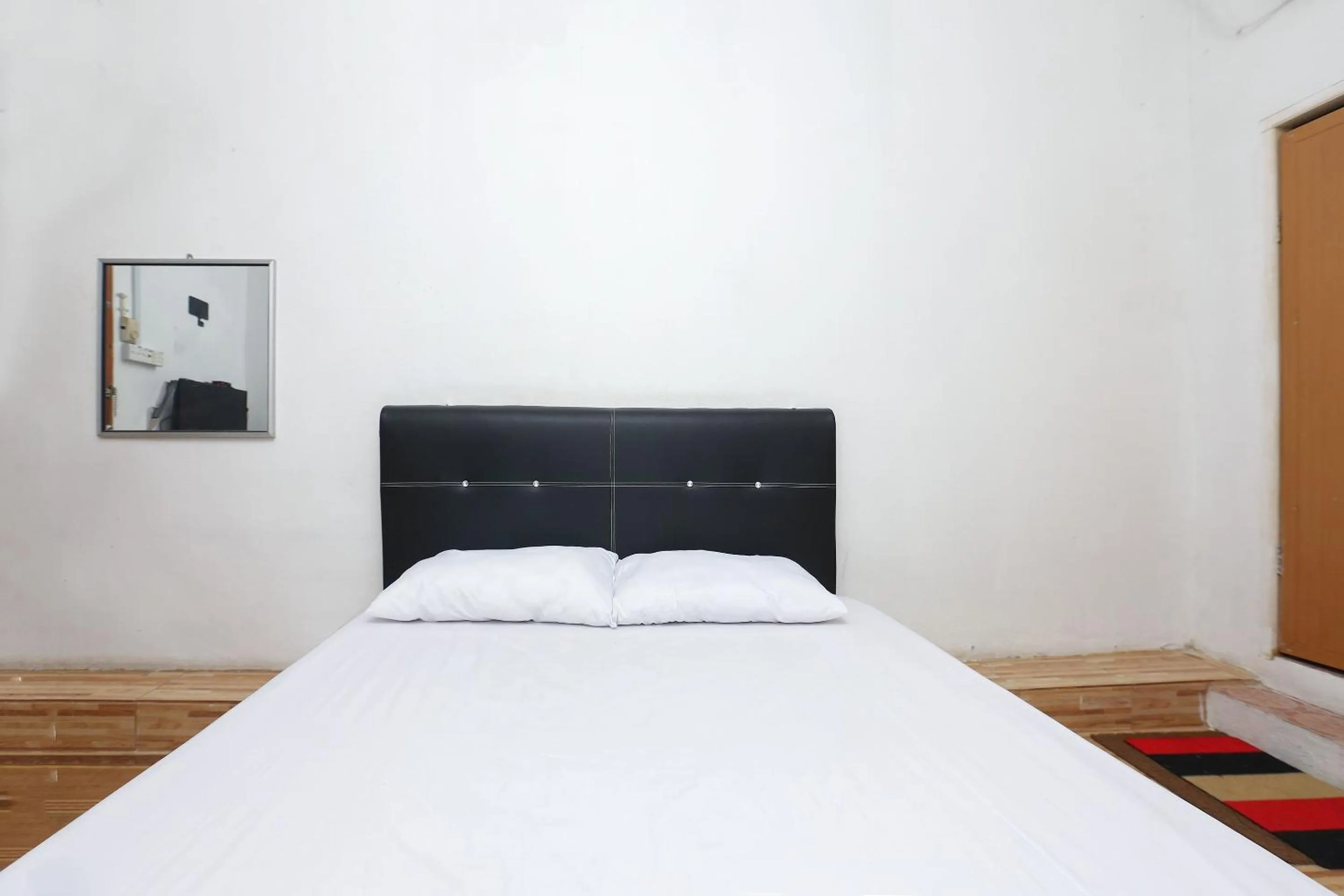 Bedroom in Hotel O D&d Budget Inn