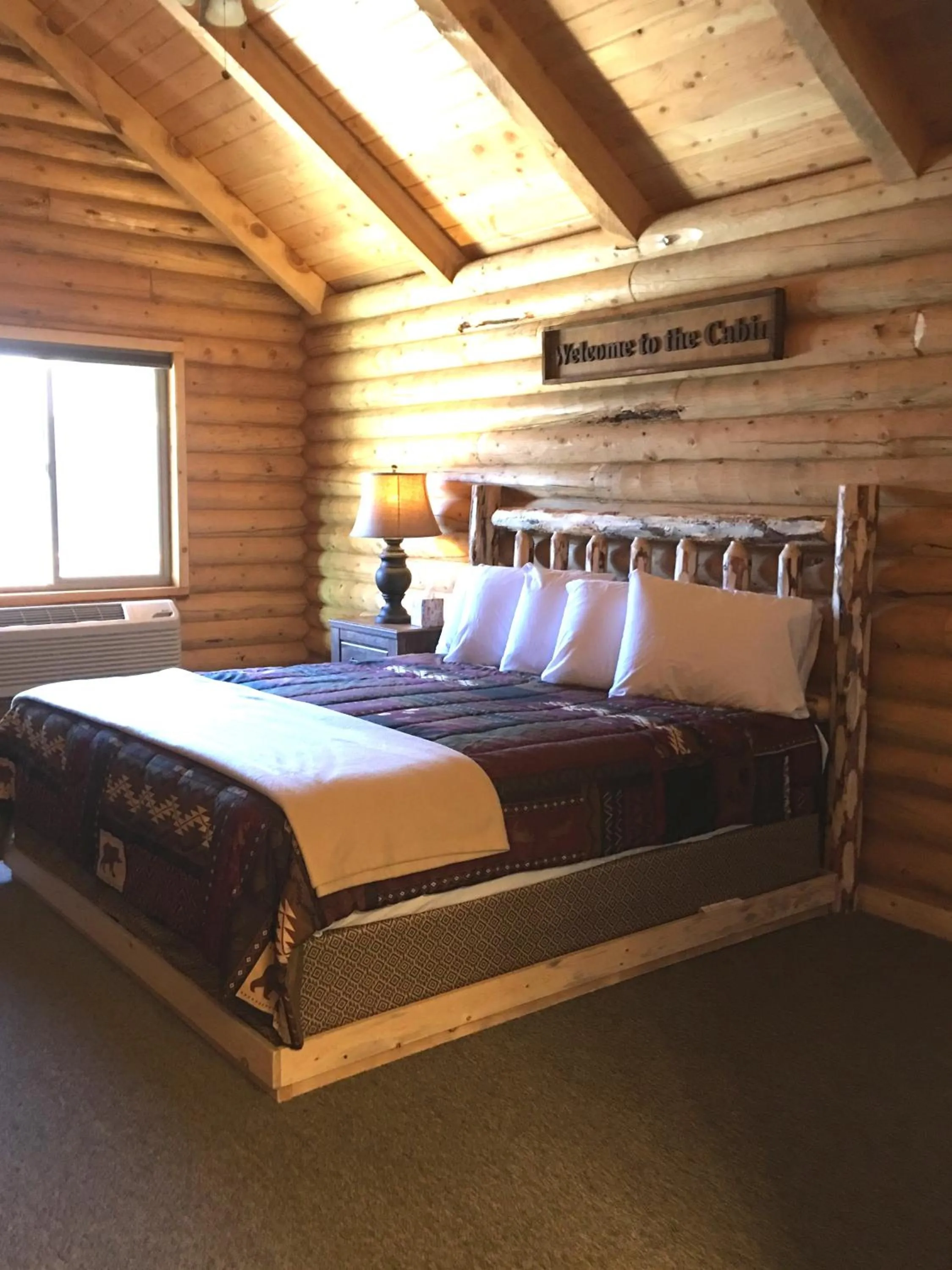 Bed in Countryside Cabins