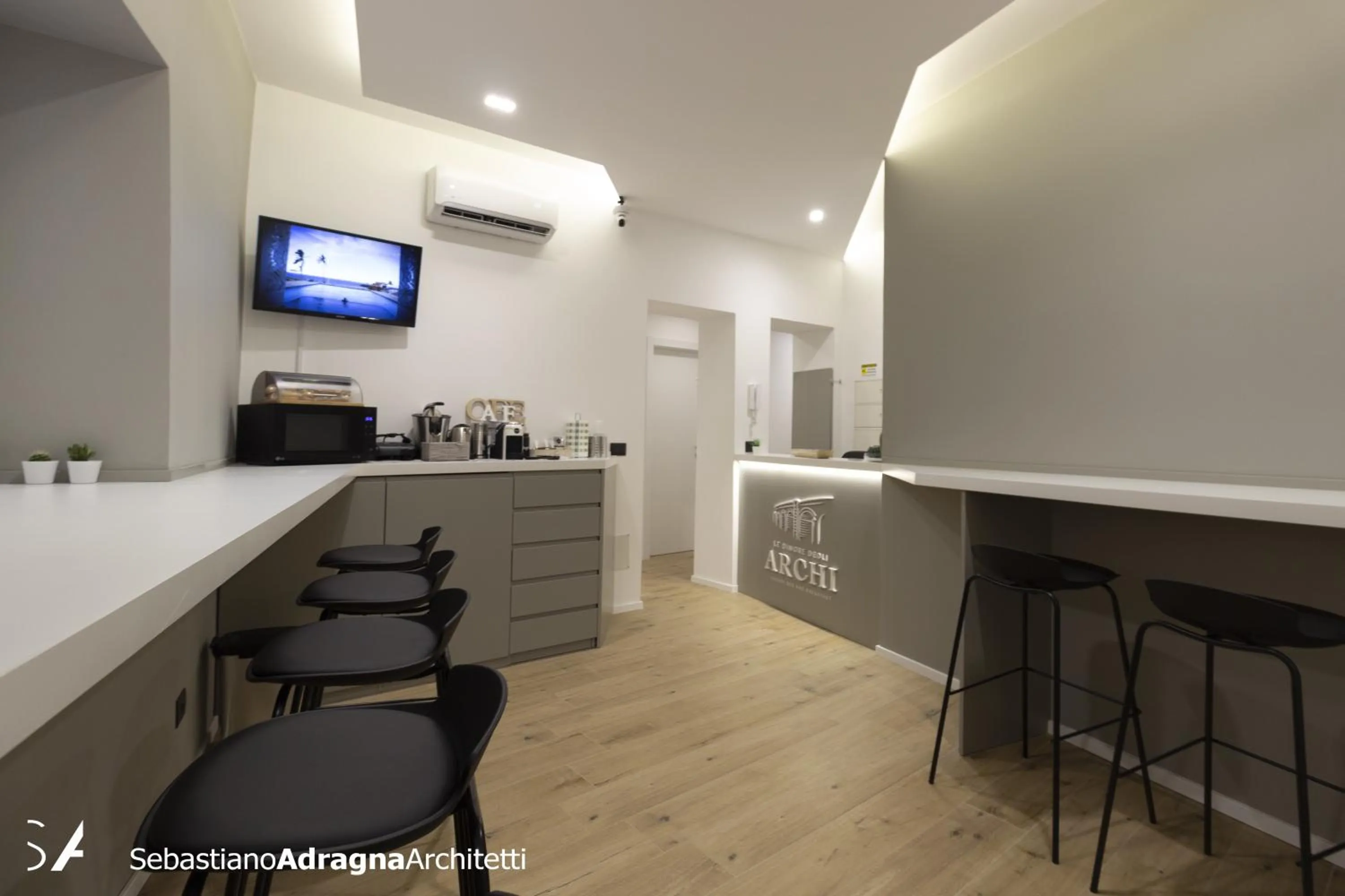 Communal lounge/ TV room in Le Dimore Degli Archi Catania