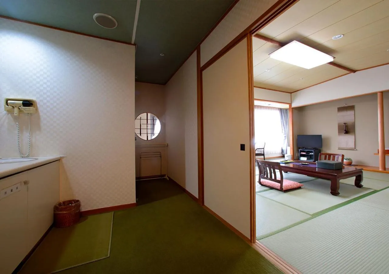 Photo of the whole room, Bed in Shikinoyado SAHIMENO