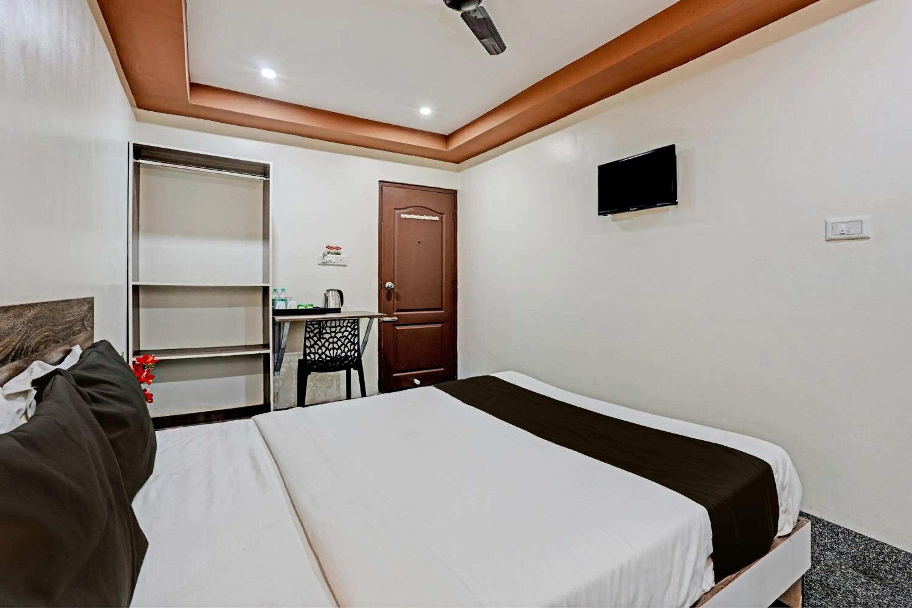 Bedroom in Hotel O Sri Sai sevalal comfort's