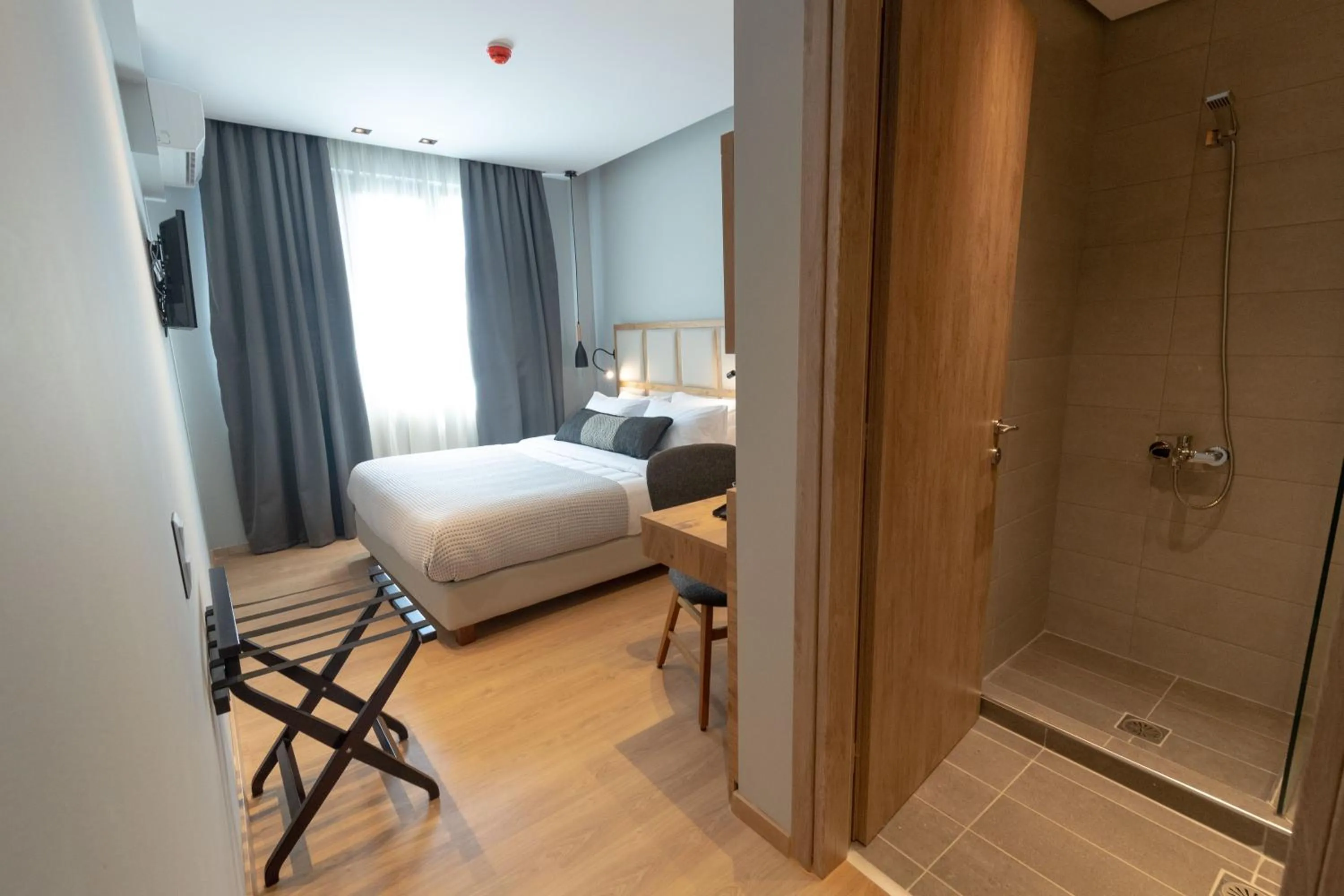 Bed in Grand Port Suites