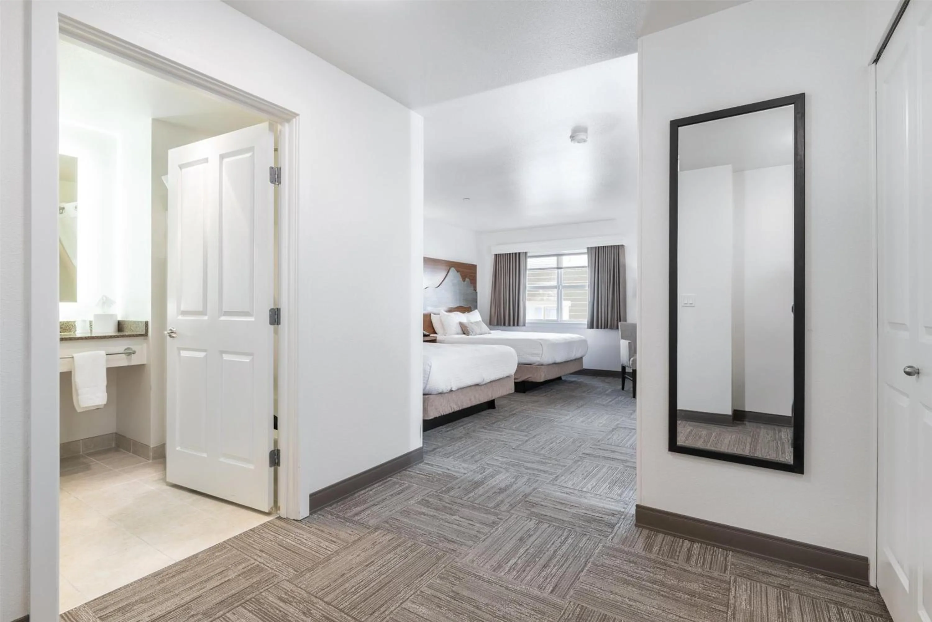 Bedroom, Bed in Marshall Suites Bainbridge Island, SureStay Collection by BW