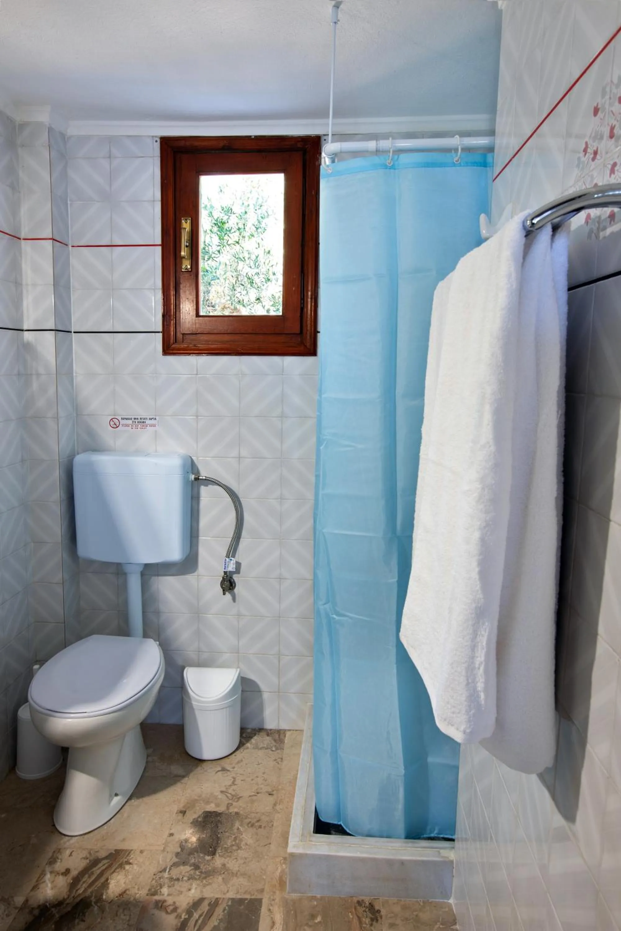 Shower in New Aurora Apts Studios