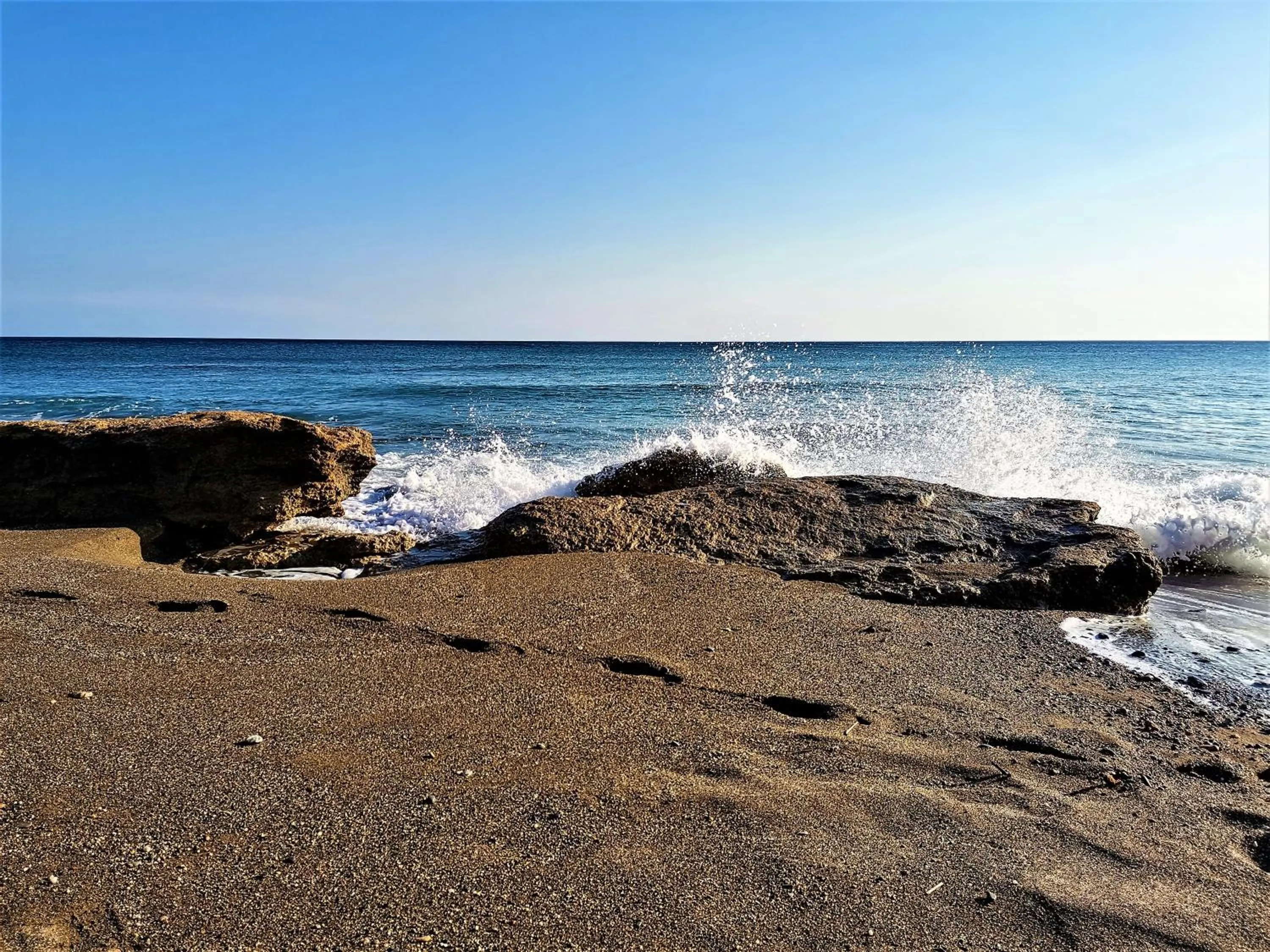 Beach in New Aurora Apts Studios