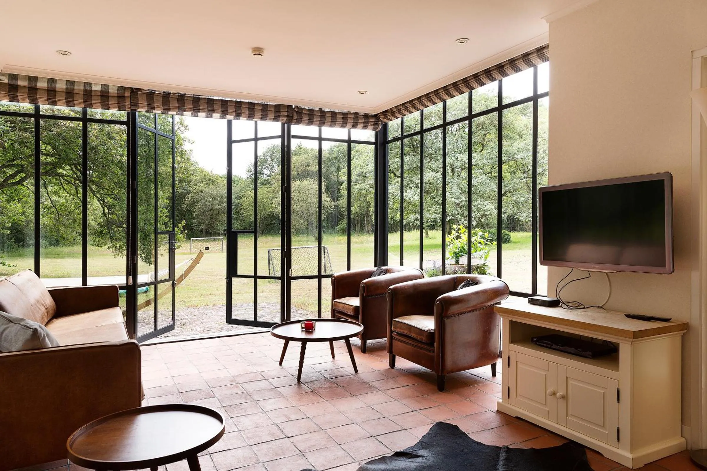 Communal lounge/ TV room in Bosvilla Kennemerduinen