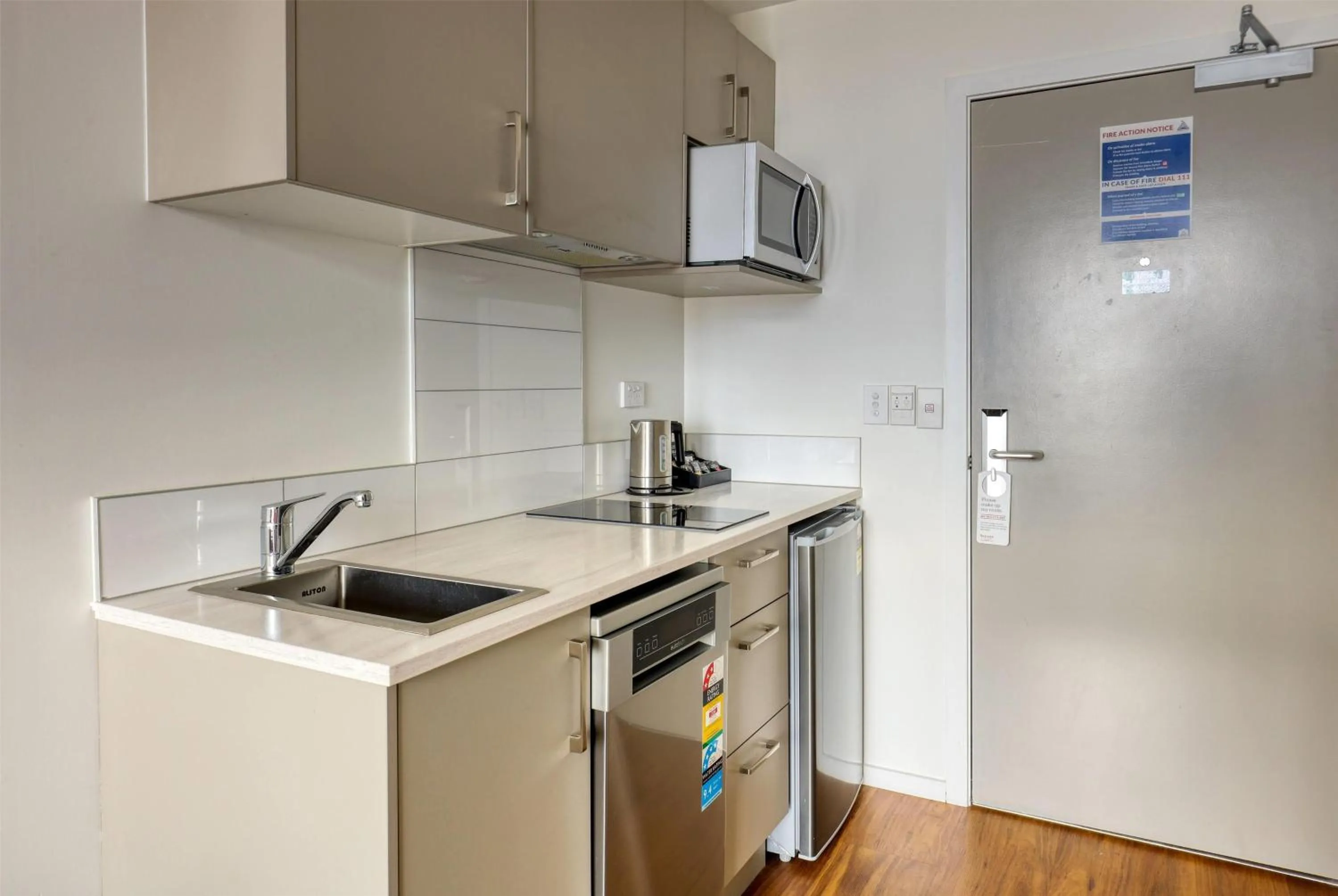 Photo of the whole room in Ramada Suites by Wyndham Auckland Manukau Pacfic Centre