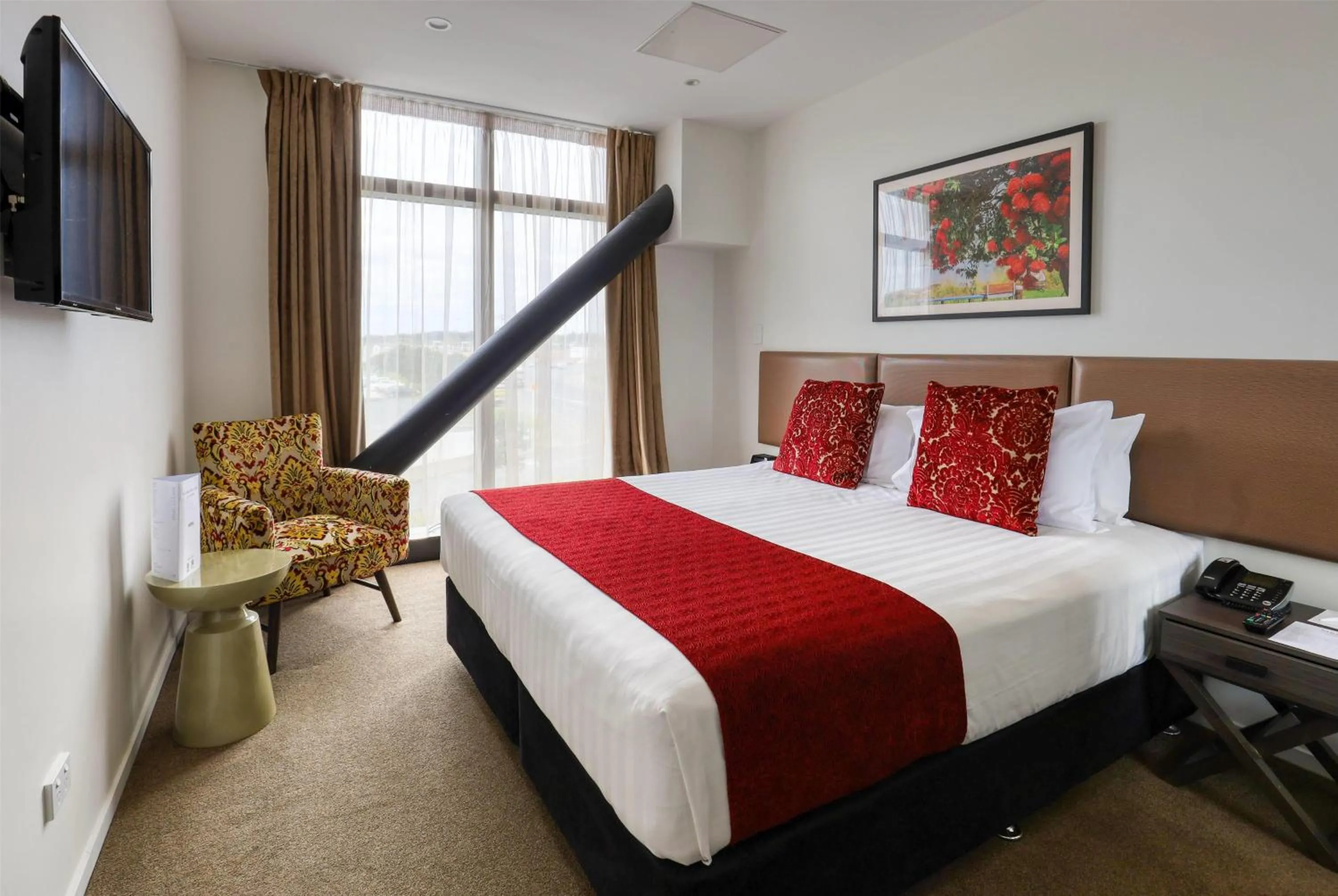 Photo of the whole room, Bed in Ramada Suites by Wyndham Auckland Manukau Pacfic Centre