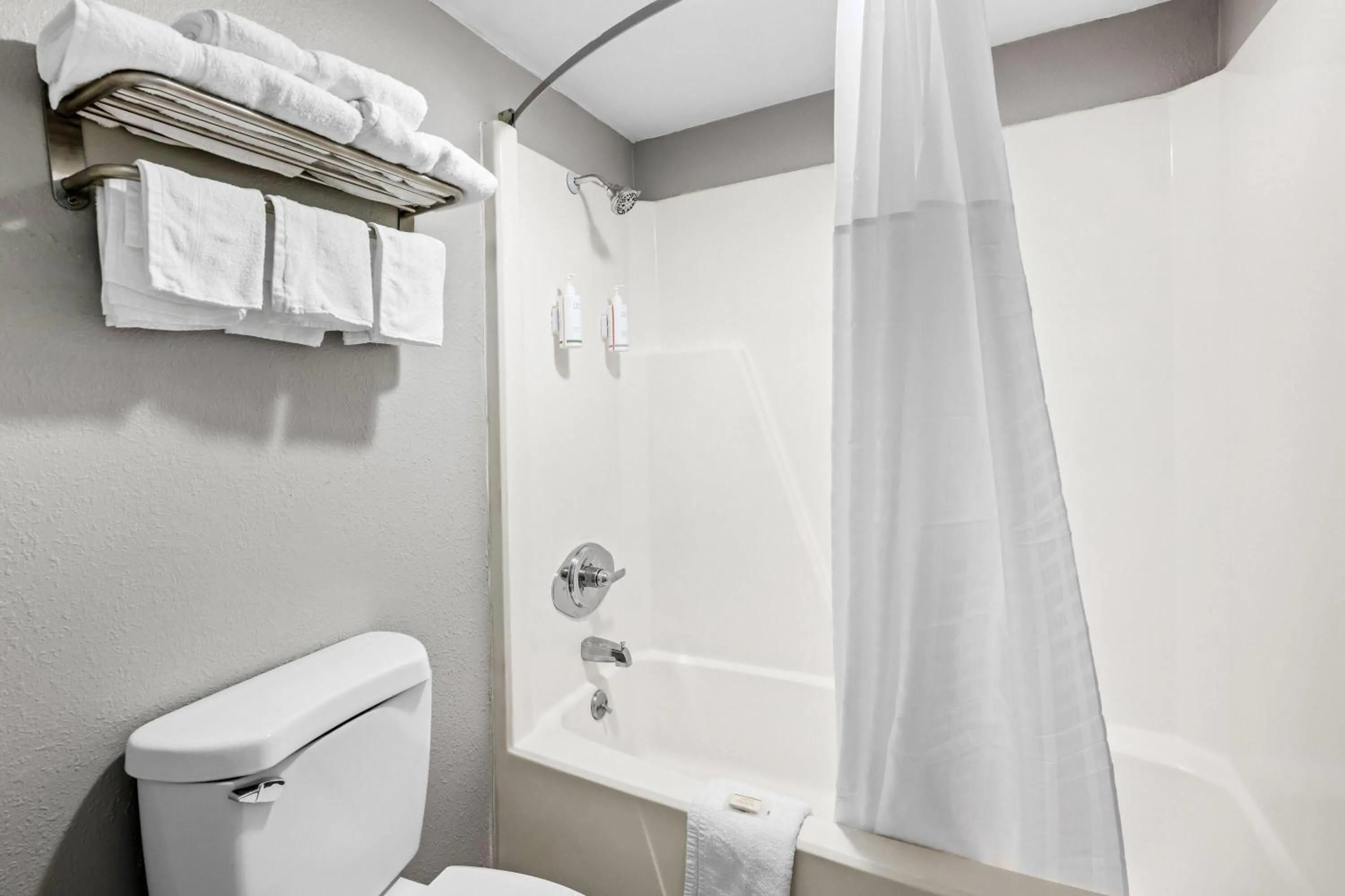 Bathroom in Super 8 by Wyndham Kingsport /I-81